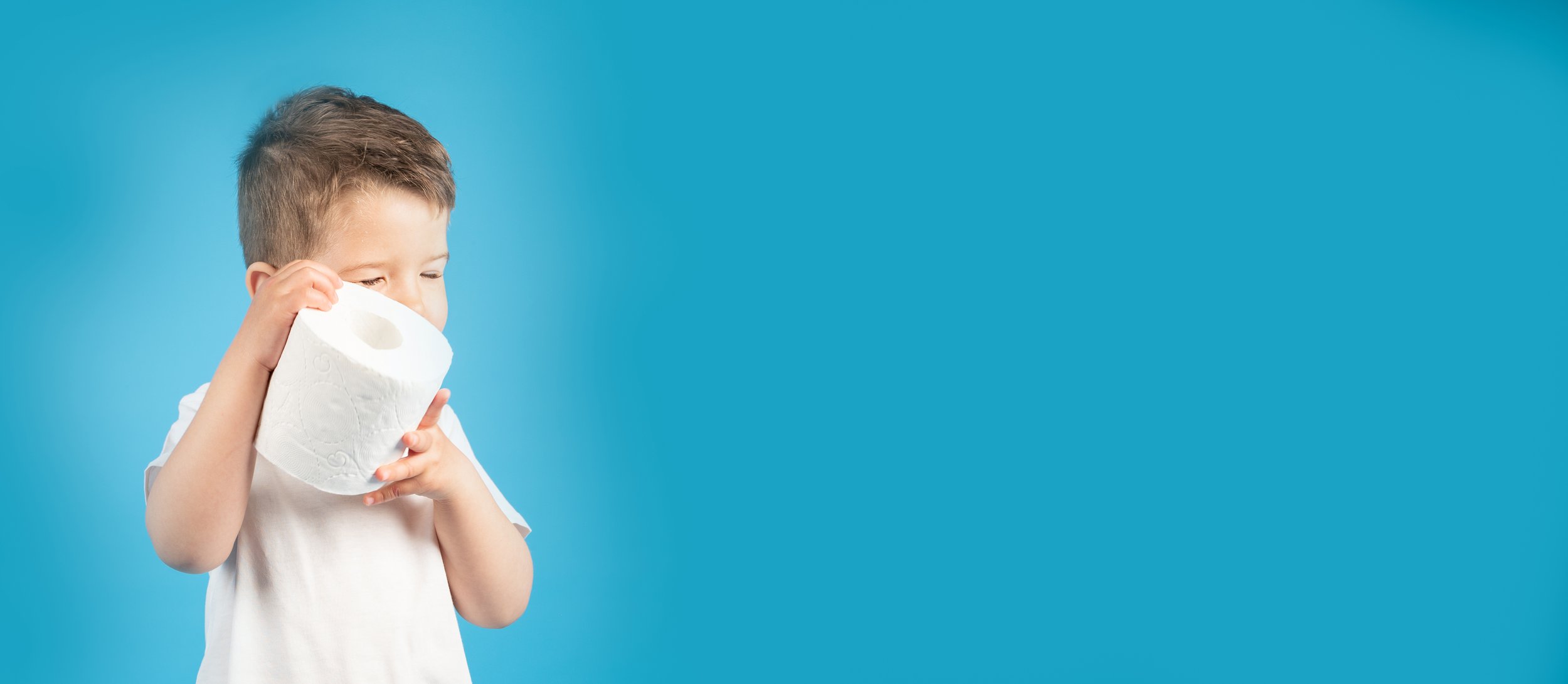 little-boy-gently-holds-his-hand-roll-toilet-paper-blue-background-banner-buying-toilet-paper-concept-high-quality-photo.jpg