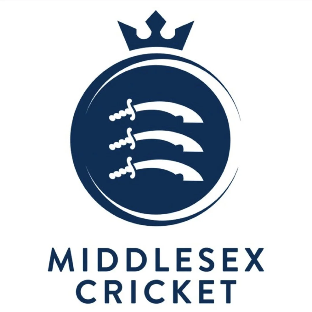 Logo of Middlesex Cricket featuring a blue crest with a crown on top, three stylized cricket bats inside, and the words 'Middlesex Cricket' below.