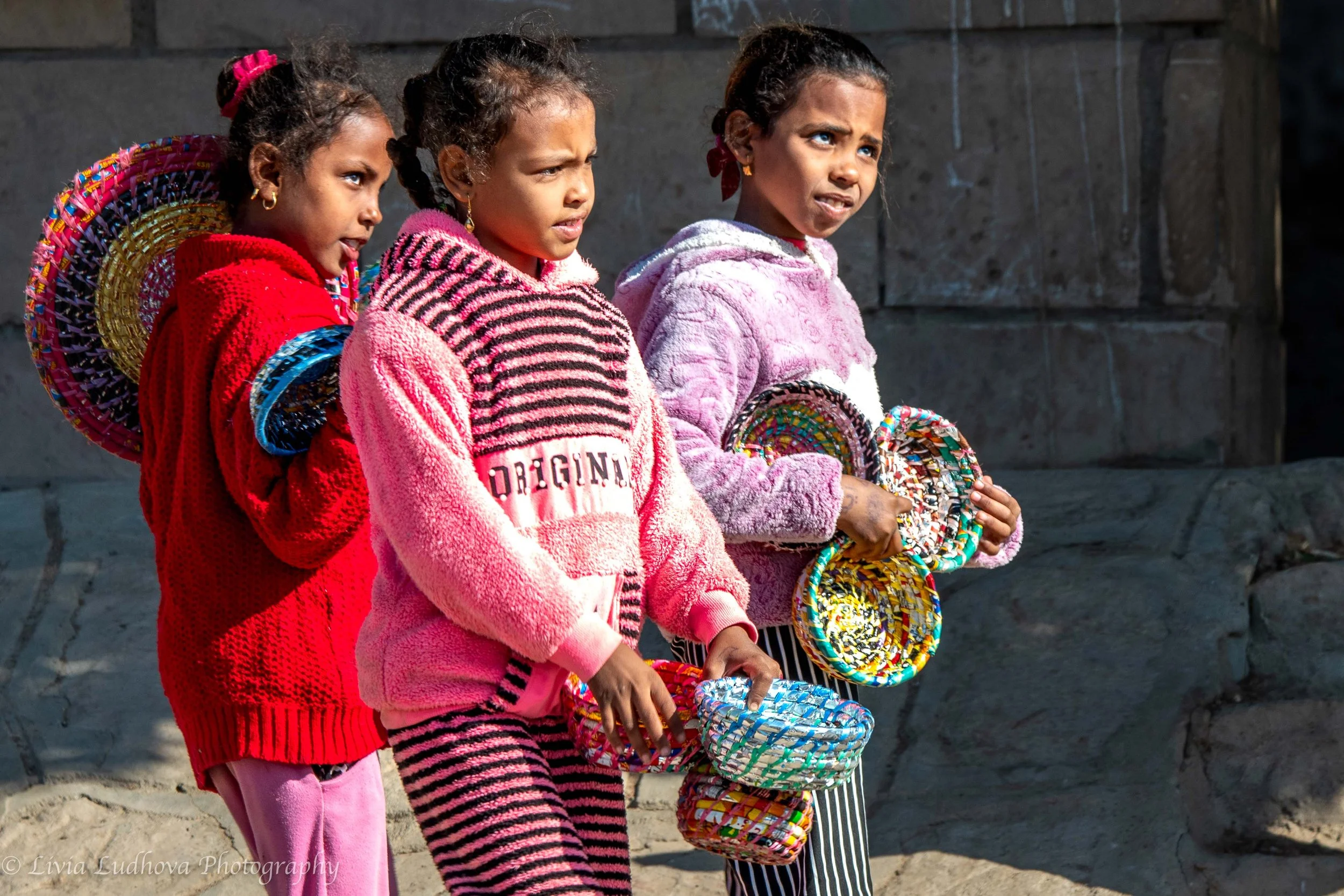 Local kids selling baskets