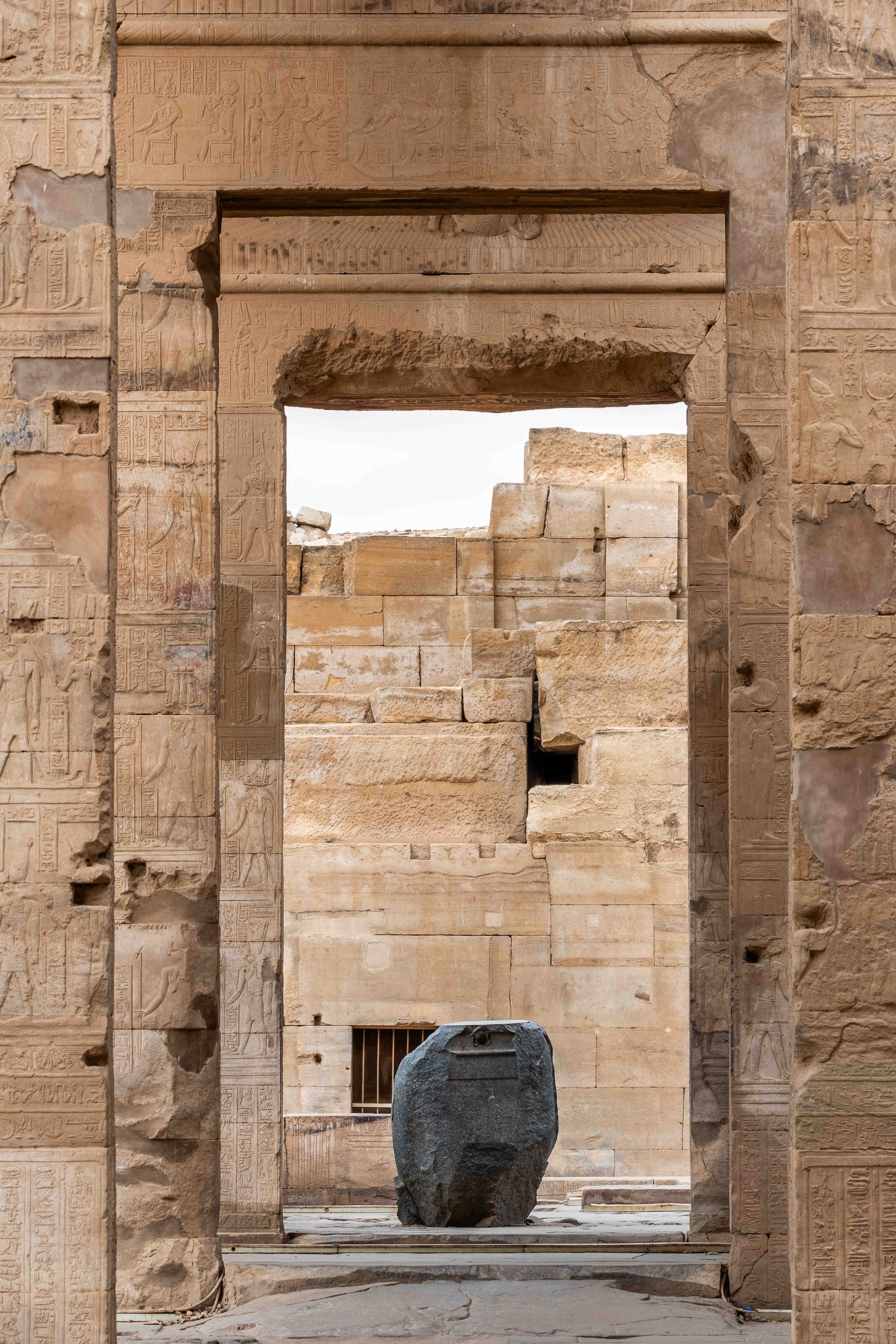 emple doorway — controlled transition between sacred spaces.