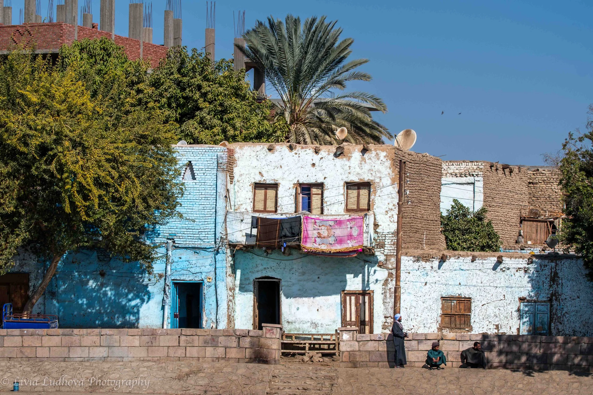 Painted village façade, Nile bank — domestic architecture shaped by river life.