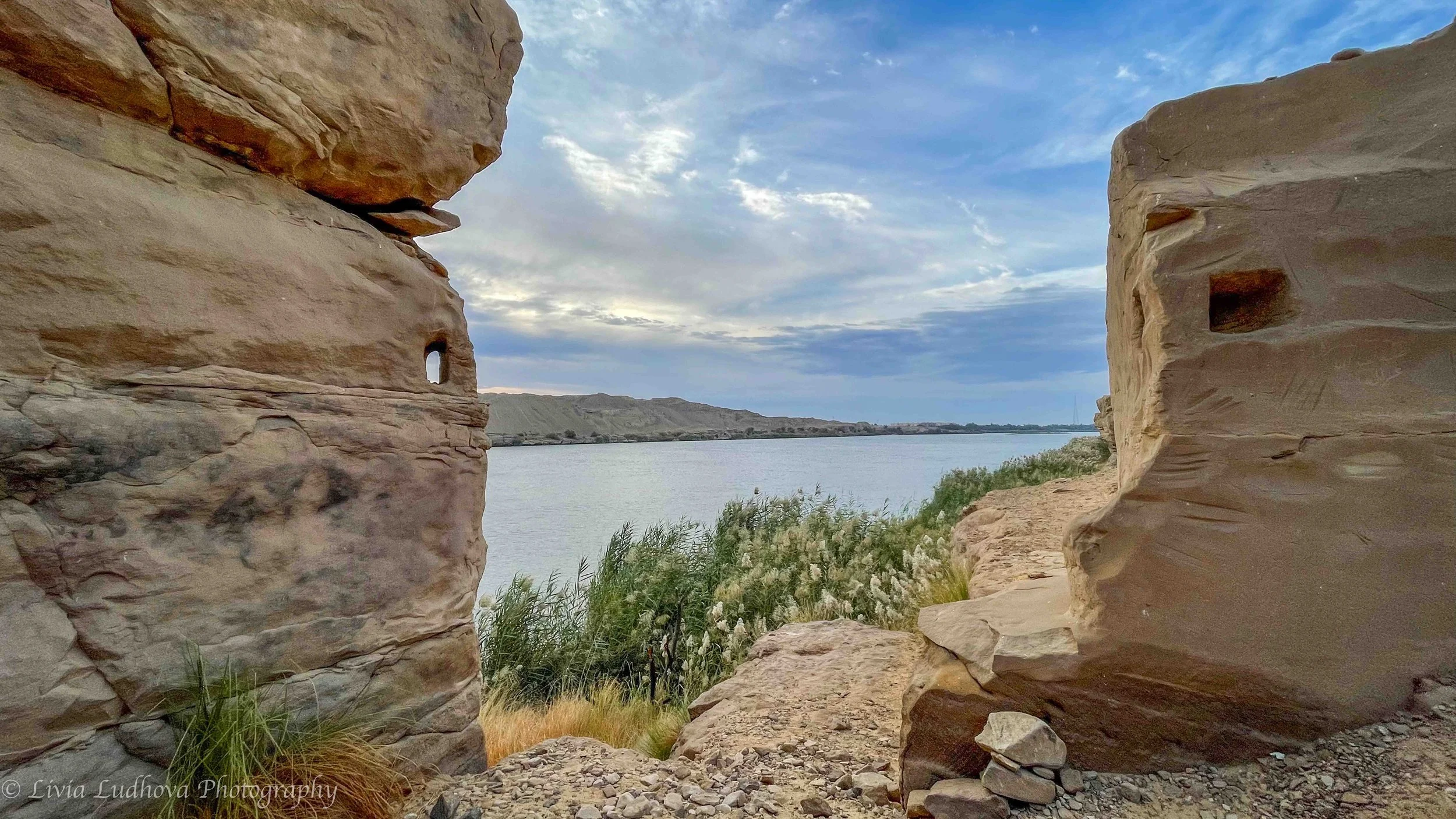 Carved deep into the sandstone at Gebel El Silsila, these rope holes once held the lines that guided stone blocks—and the work of countless hands—toward the Nile.
