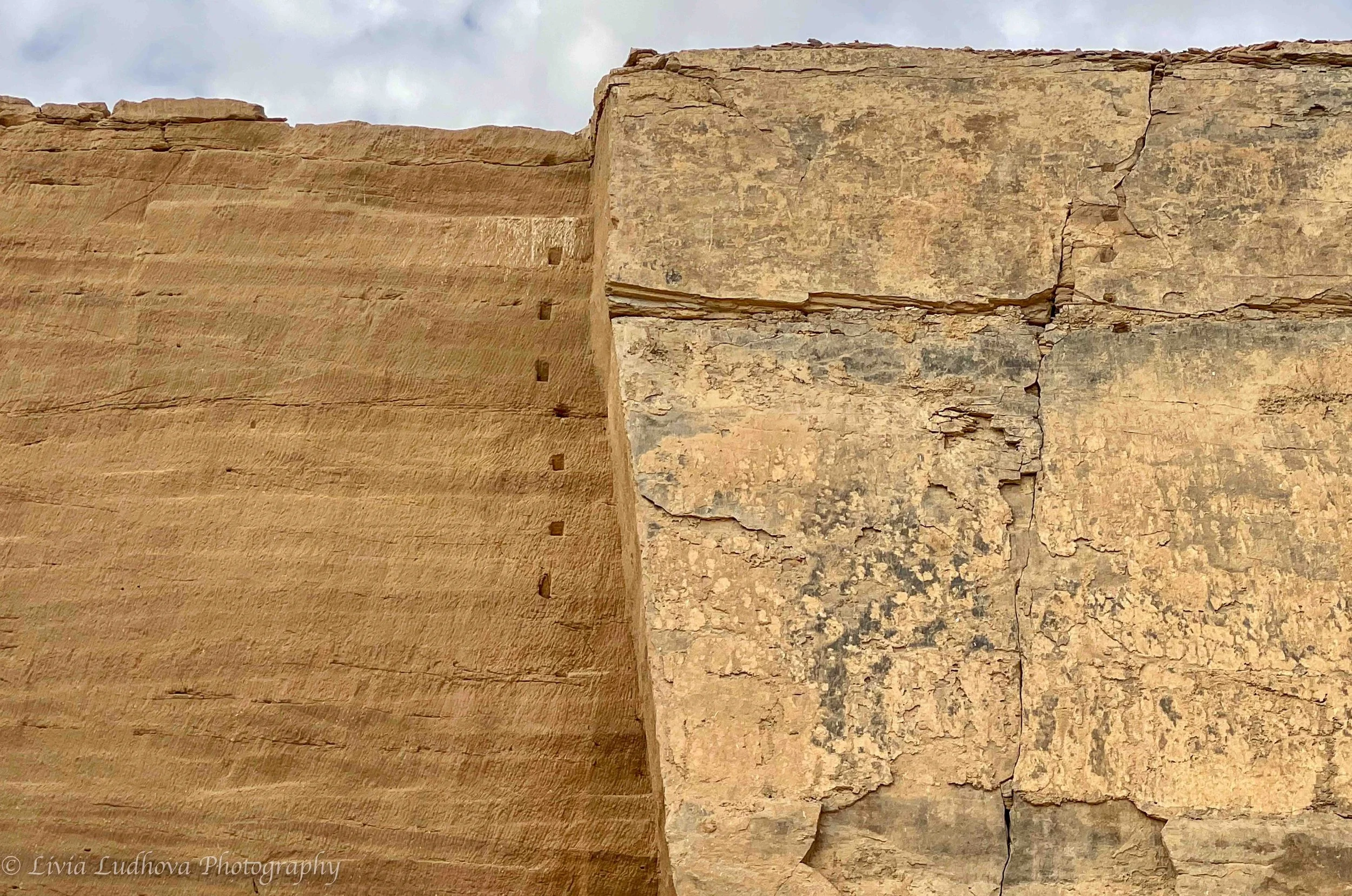 The holes in the rock served as a ladder for the workers to reach upper layers of the quarry .