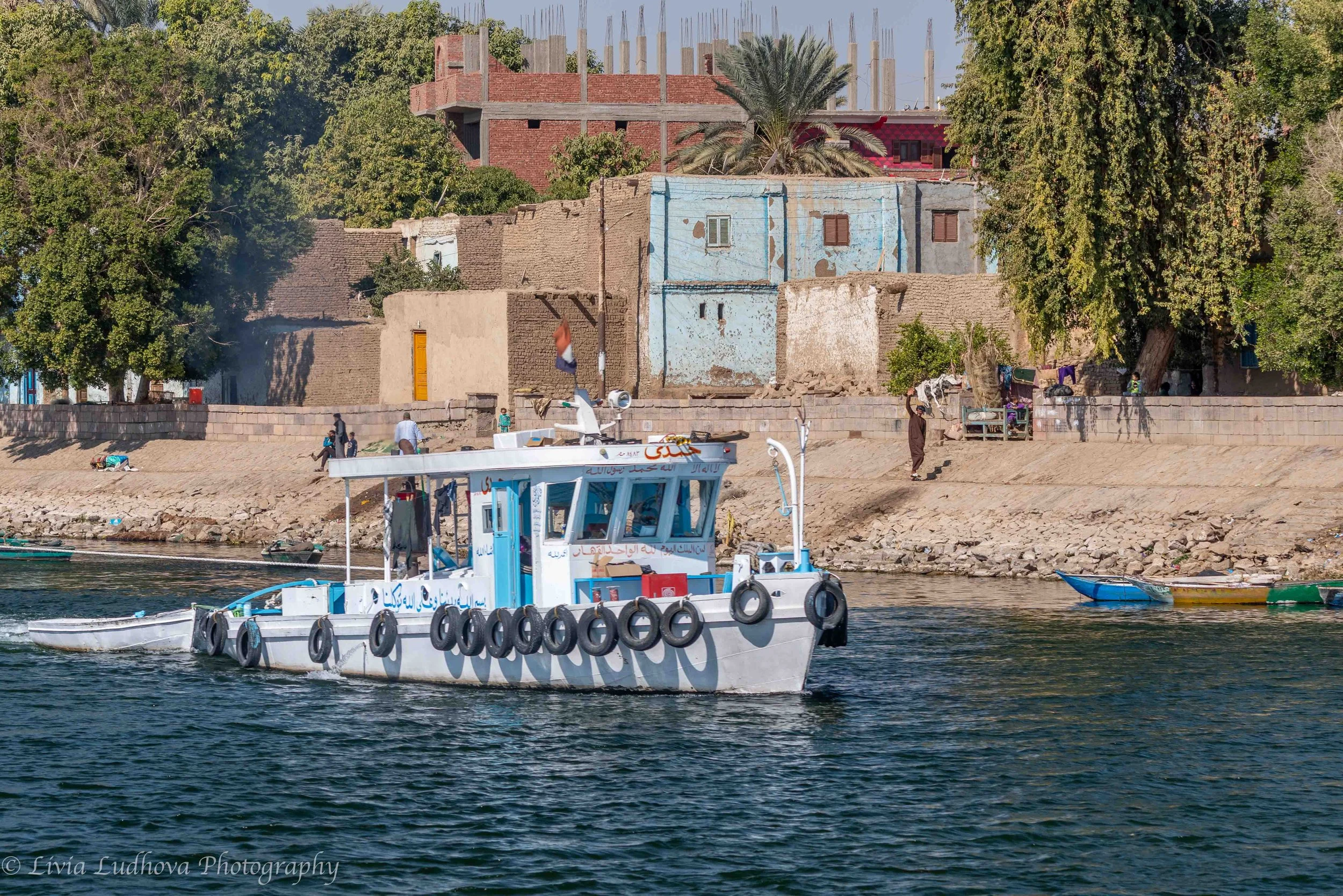 Passenger boat approaching the bank.