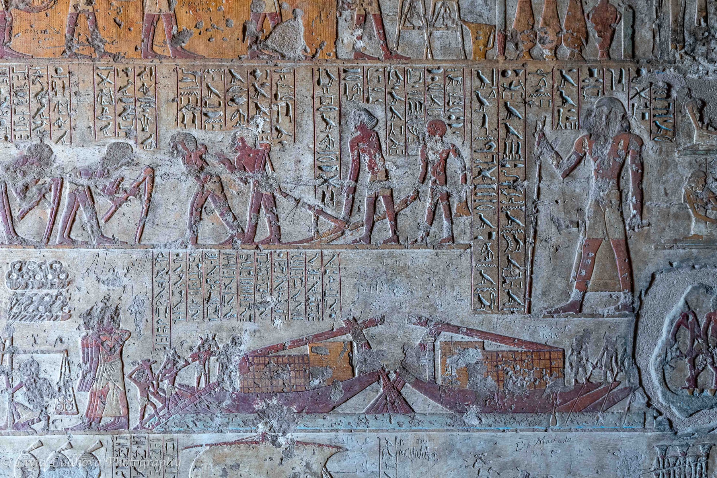 Painted relief panel with offering procession, attendants bring food and goods for the tomb owner, reflecting funerary provision and elite status.