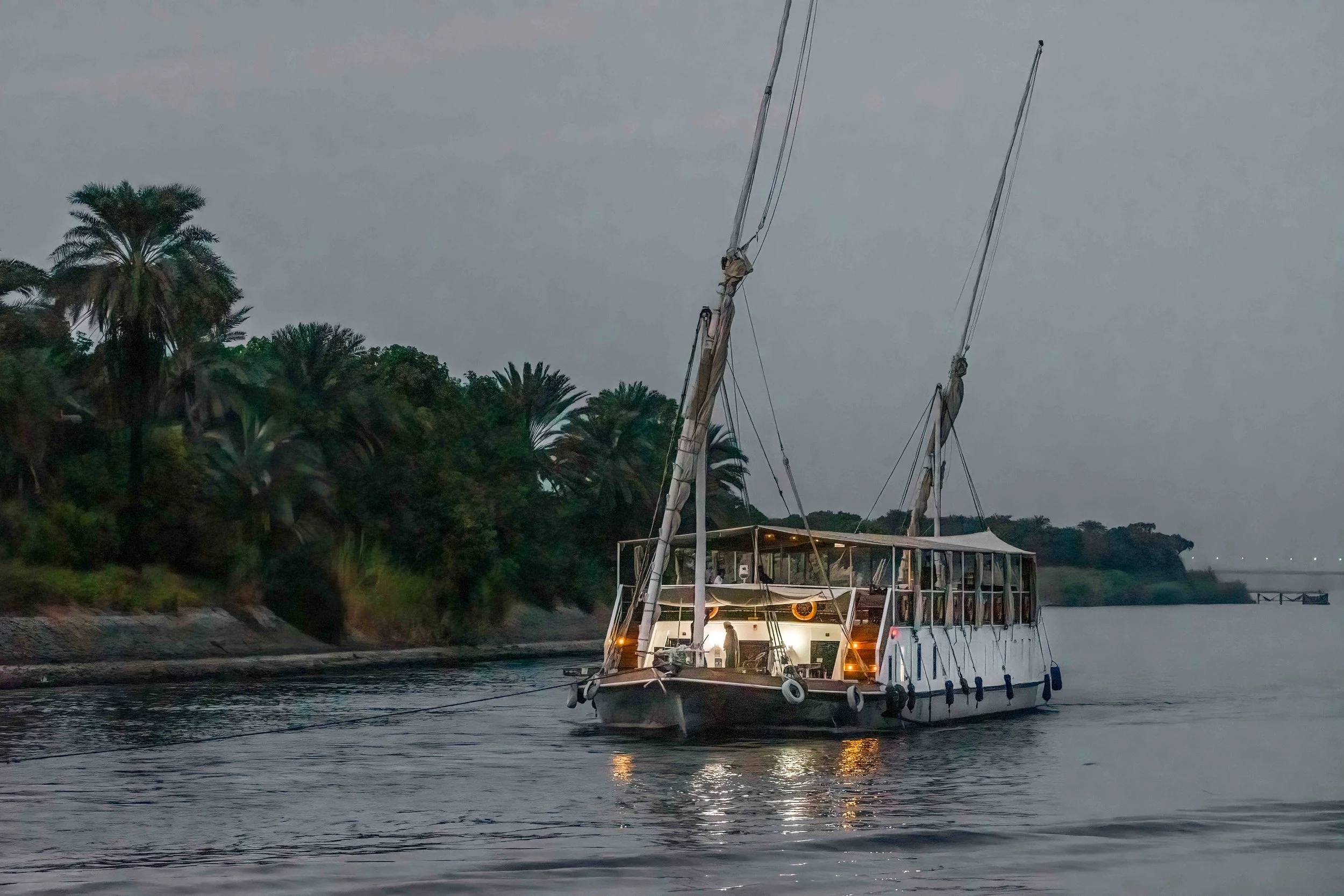 Evening navigation — calm Nile conditions at dusk.