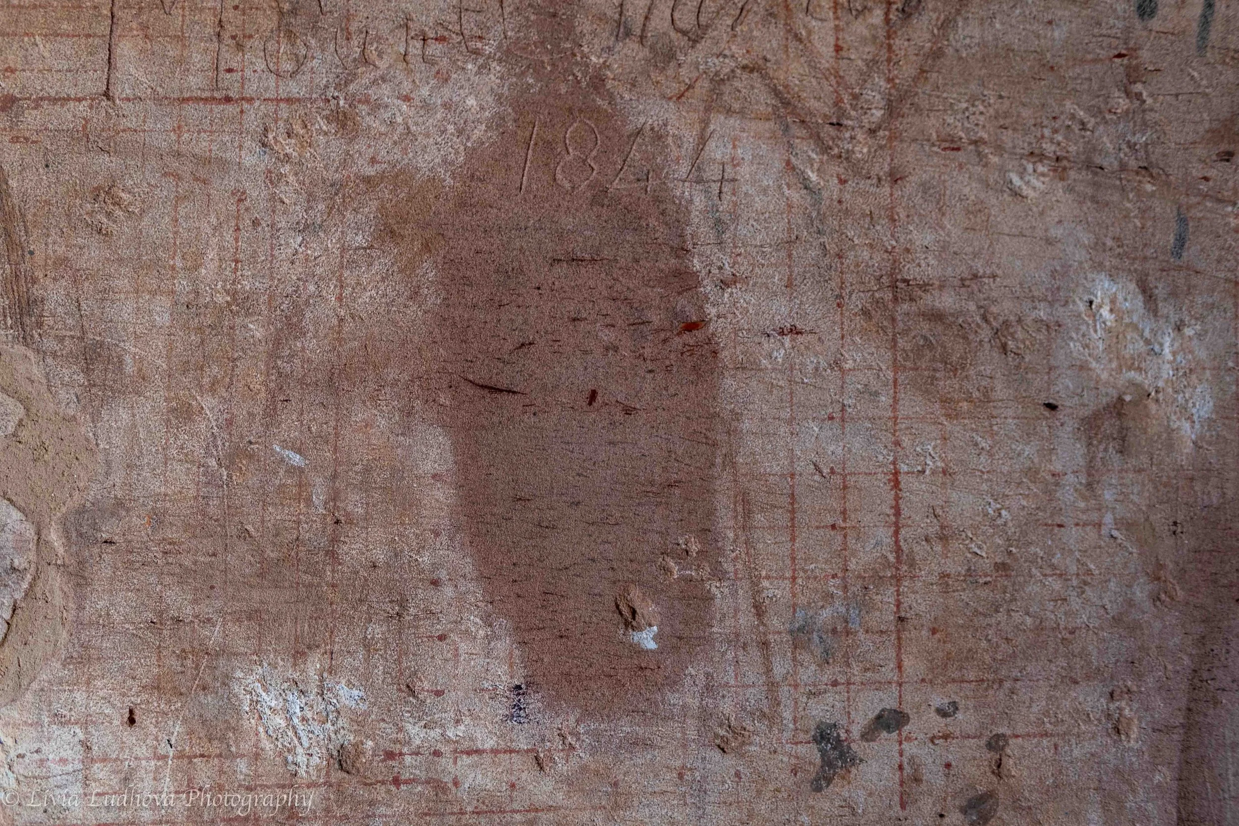 Unfinished relief with preparatory grid (raster).