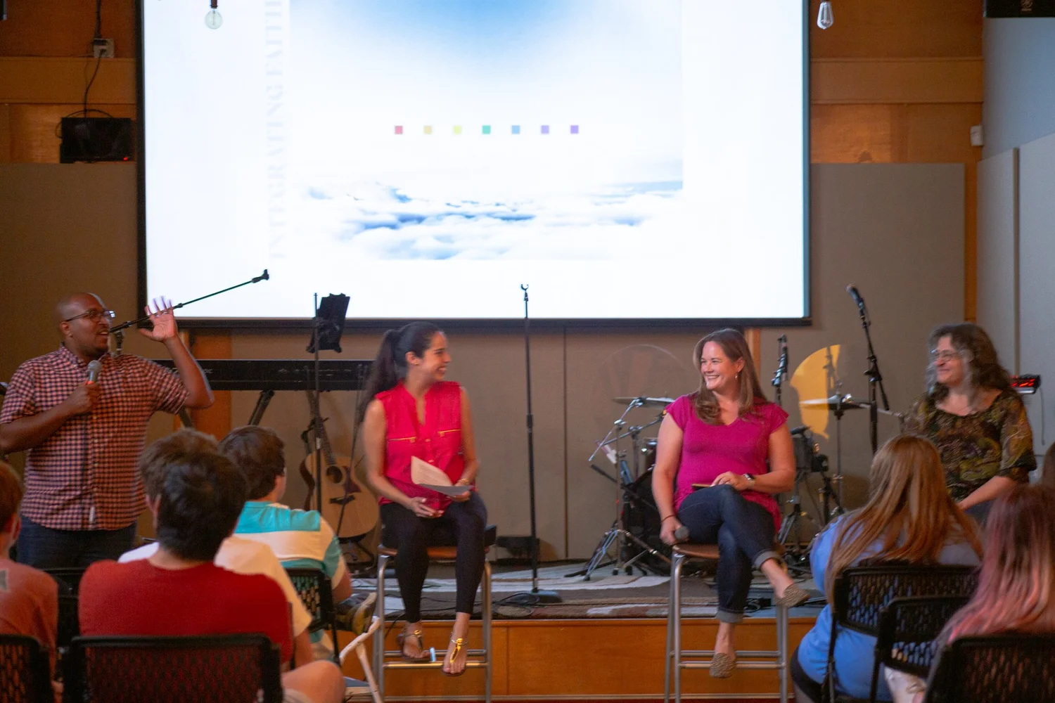 Jackie DaHora speaking on a panel about faith and mental health