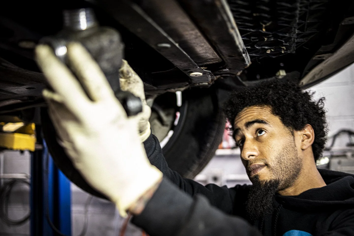 Little Garage tech working on a German vehicle.jpg