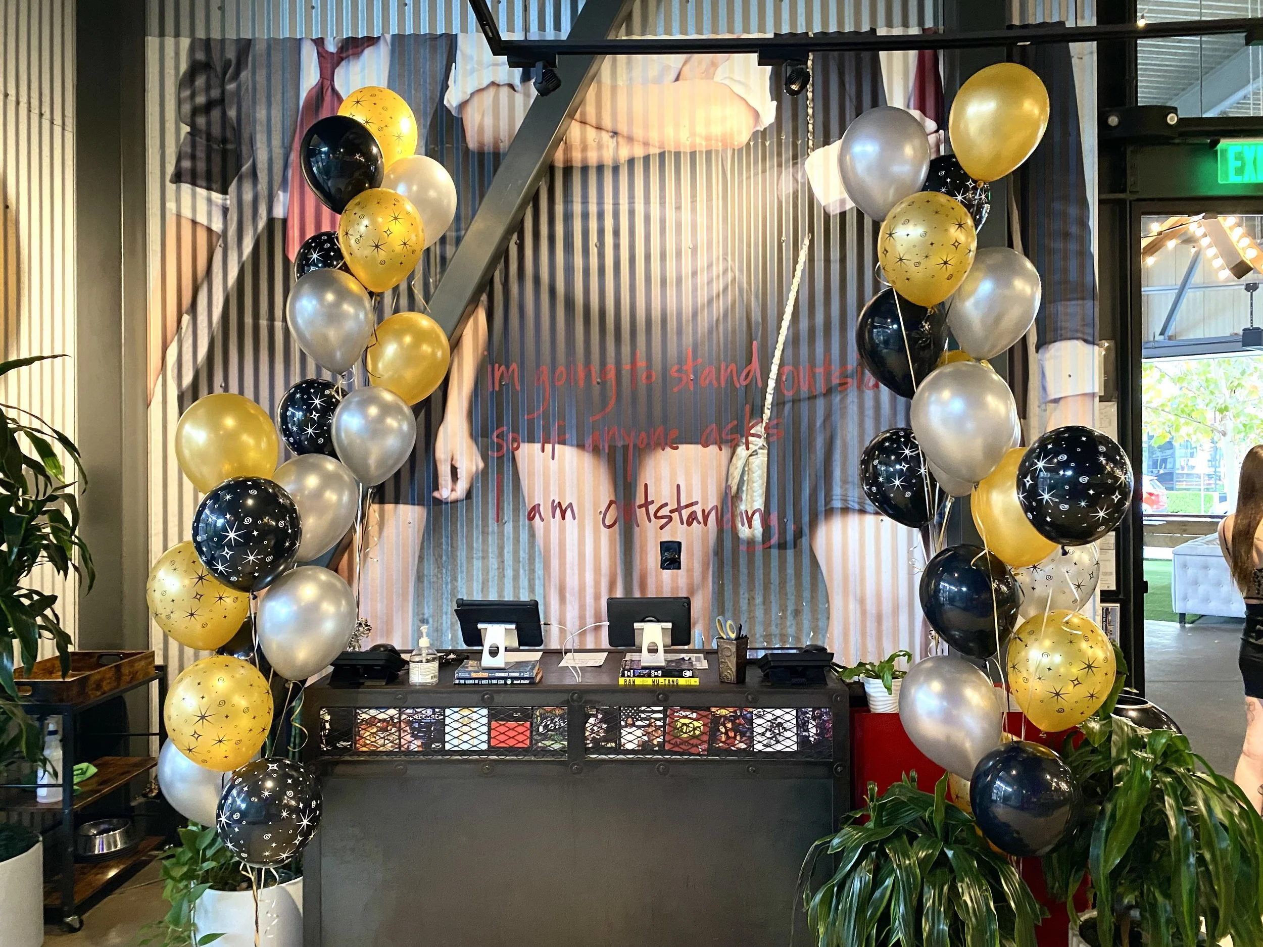 Gold silver and black balloon bouquets