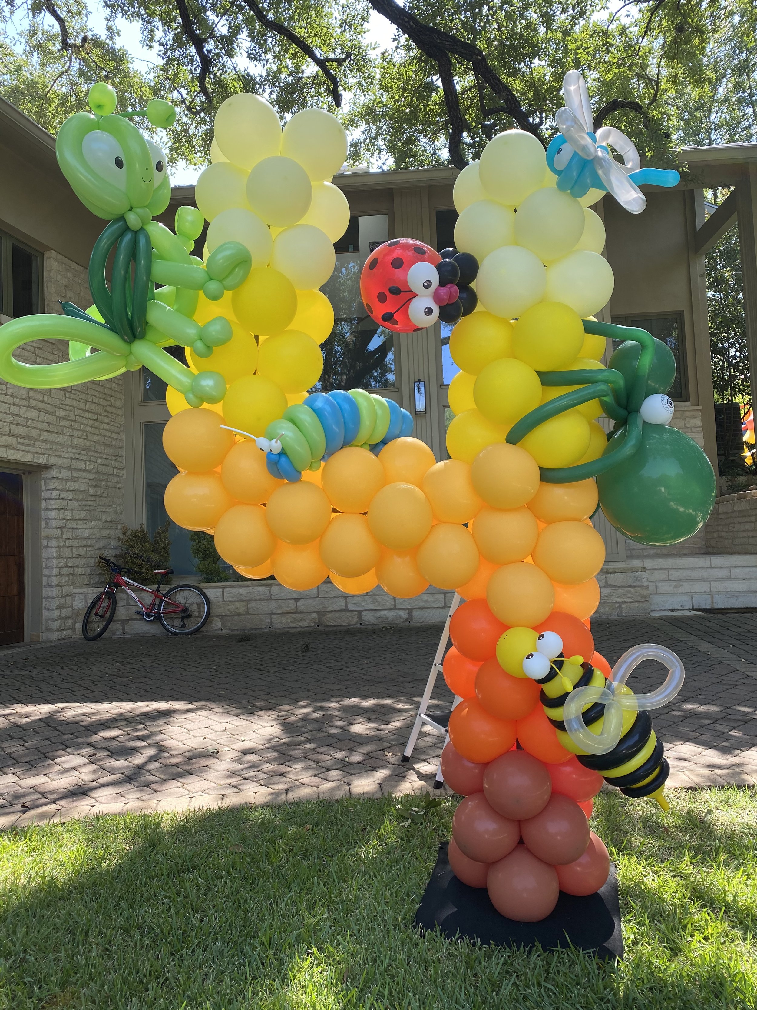 Number 4 balloon with balloon animals