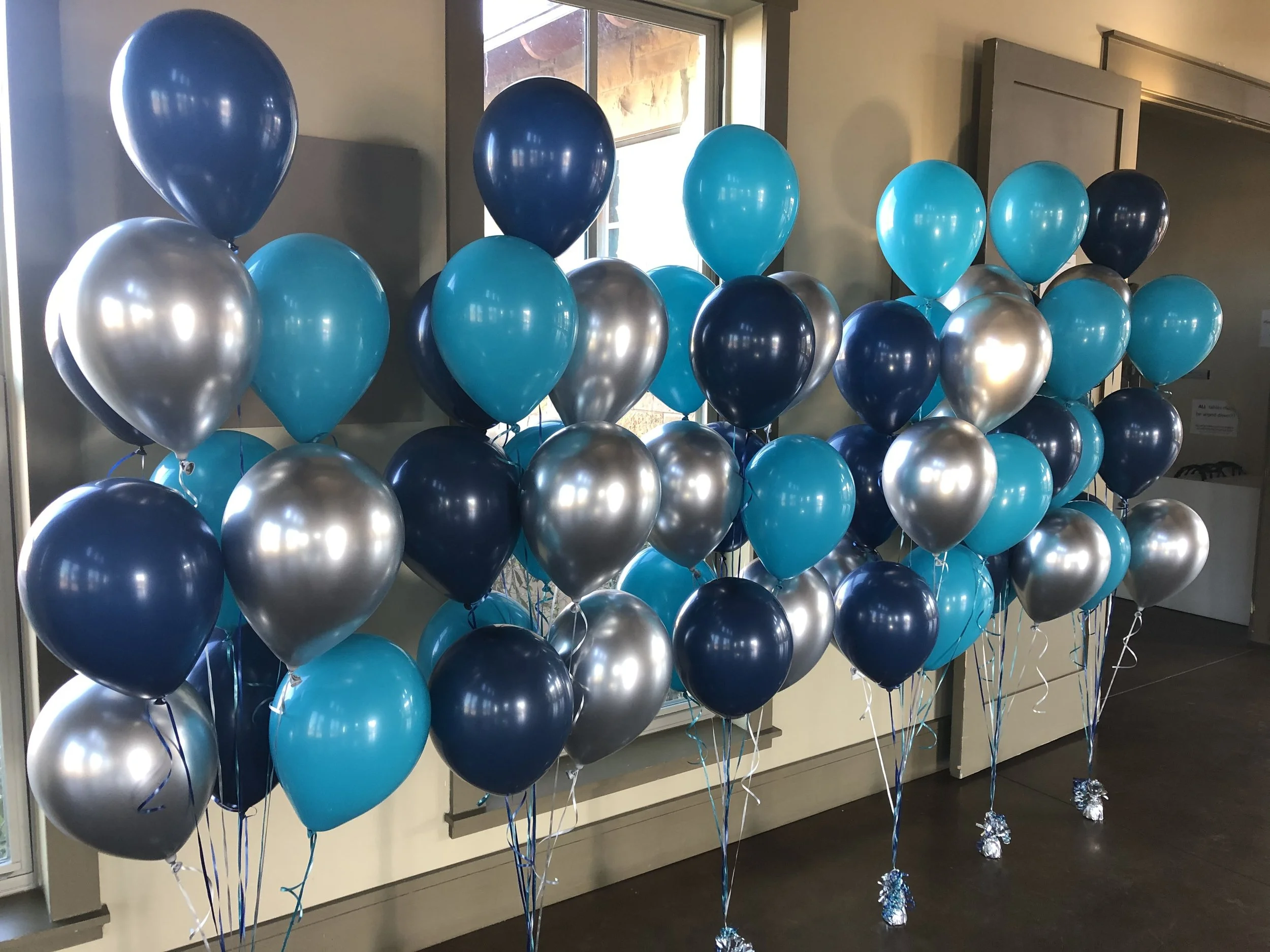 Latex balloon bouquets with foil weights