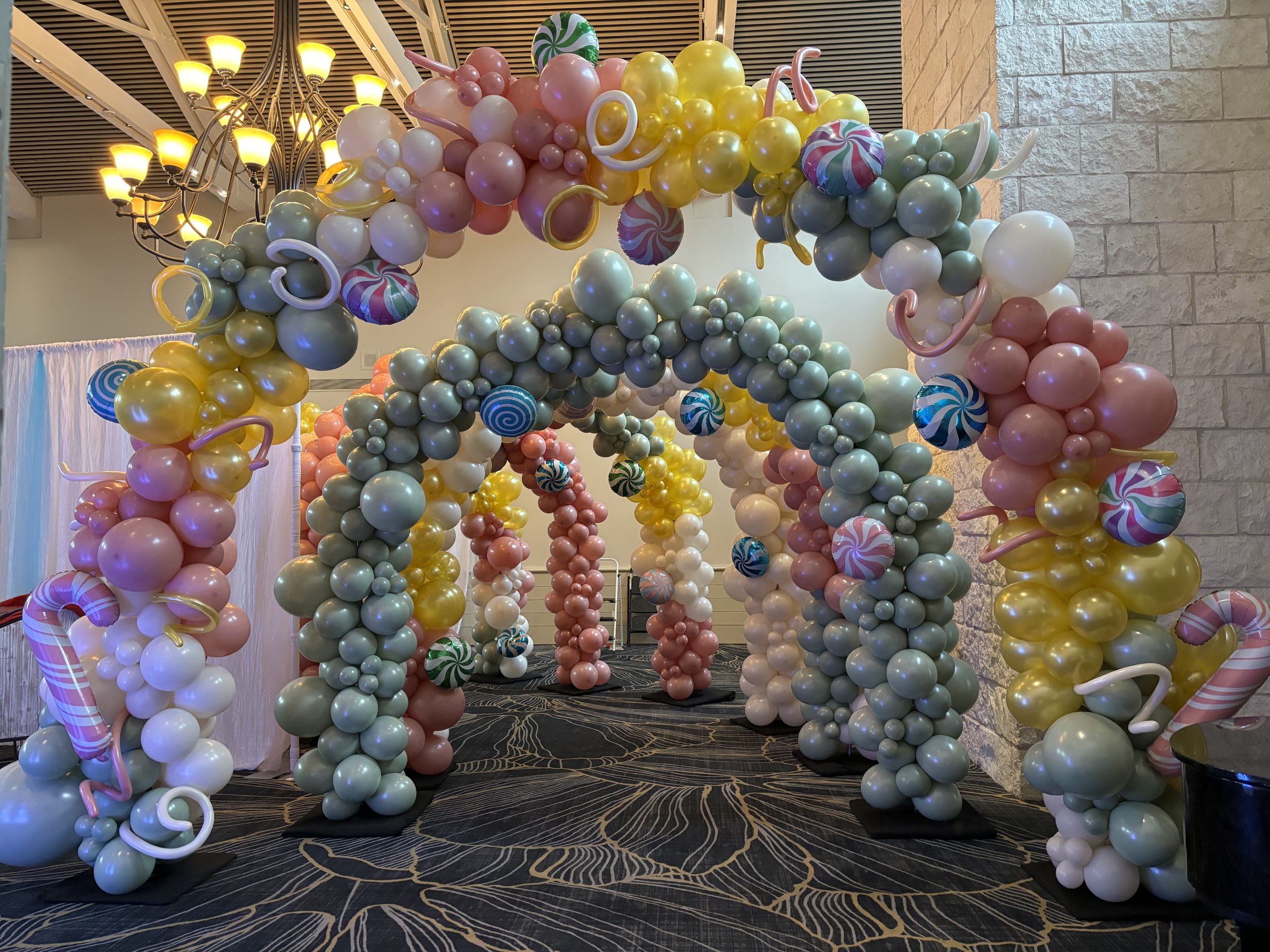 candy themed balloon arch