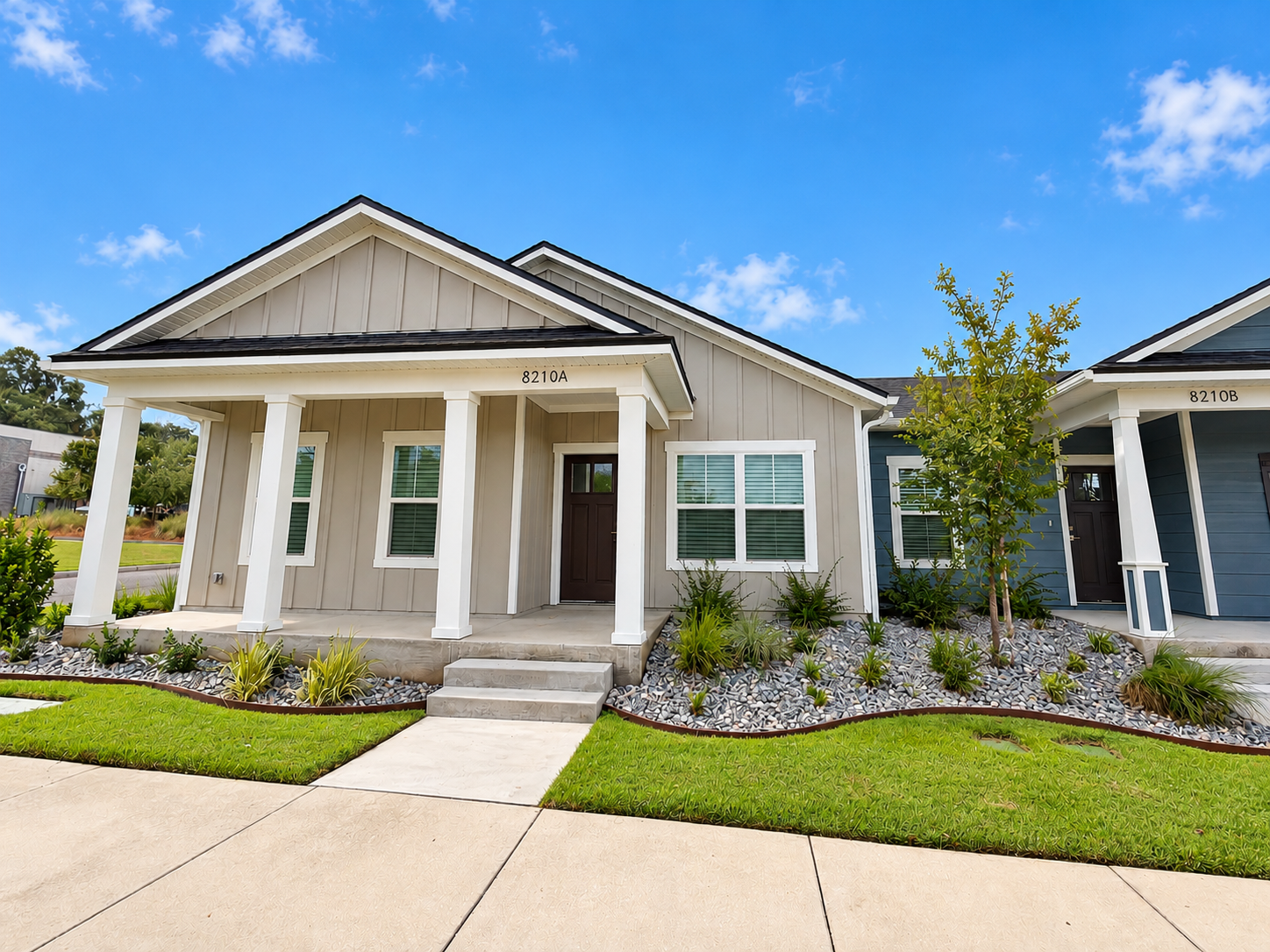 Exterior view of the left-side three-bedroom, two-bathroom duplex rental at Cottages on the Avenue in Gainesville, Florida.