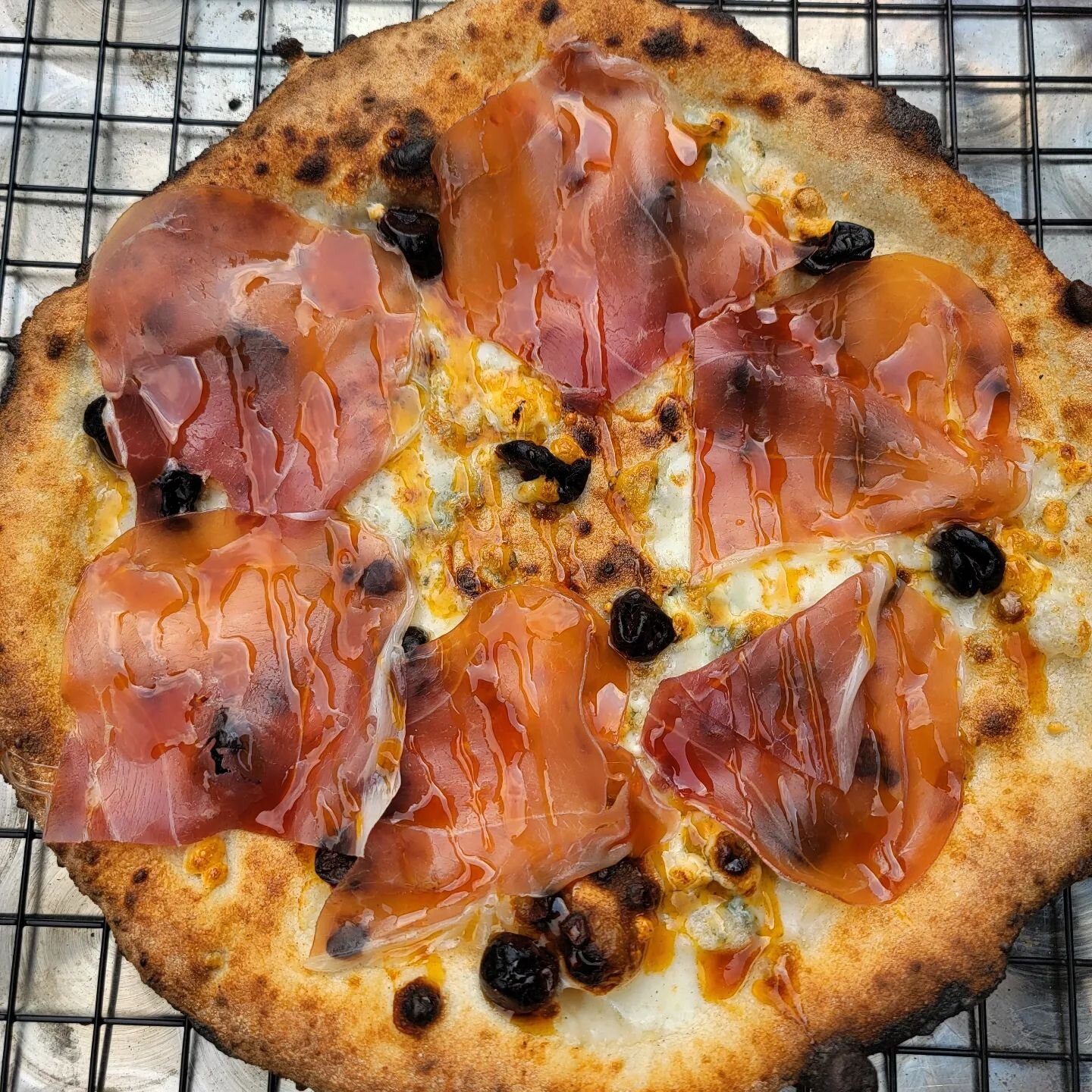 I had this pizza at @pauliegeeslogansquare and was inspired to make my own. Mozzarella &amp; Gorgonzola, Dried Cherries, Prosciutto di Parma, @mikeshothoney.

#pizza #pizzapizza #pizzaparty #pizzatime #pizzalife #pizzalover #pizzagram #woodfired #woo