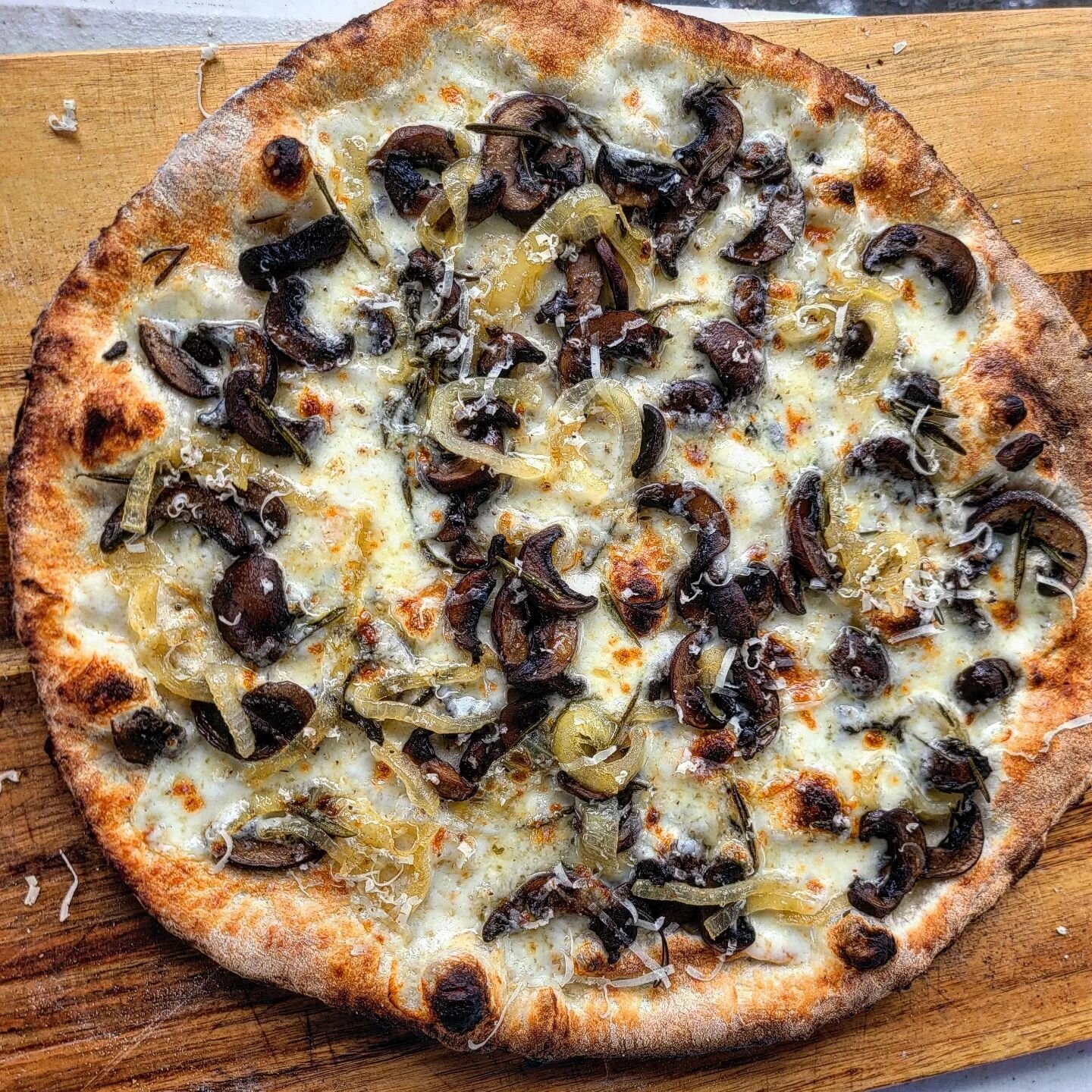 One of my favorites from our first party of the year:

Herb Roasted Mushrooms, Caramelized Onions, Mozzarella, Moliterno al Tartufo (sheep's milk truffle cheese), Truffle Oil

#pizza #pizzapizza #pizzaparty #pizzatime #pizzalife #pizzalover #pizzagra