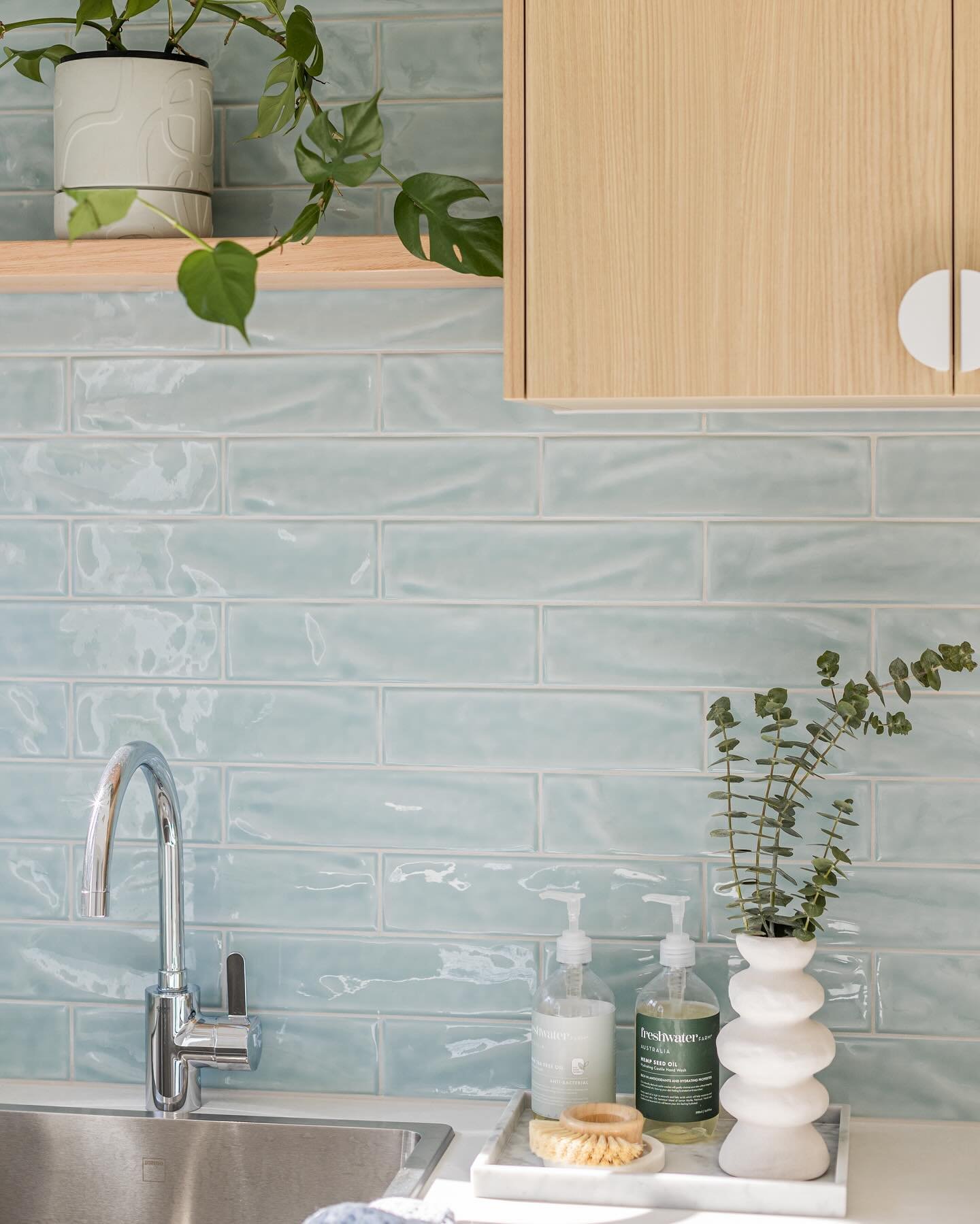 It seems our laundry love was VERY loved. 

Here&rsquo;s some more details about this space. Our brief was: coastal &amp; fun. So we used a pop of bright coastal teal in the tile choice with a classic brick formation pattern to tie in with the client