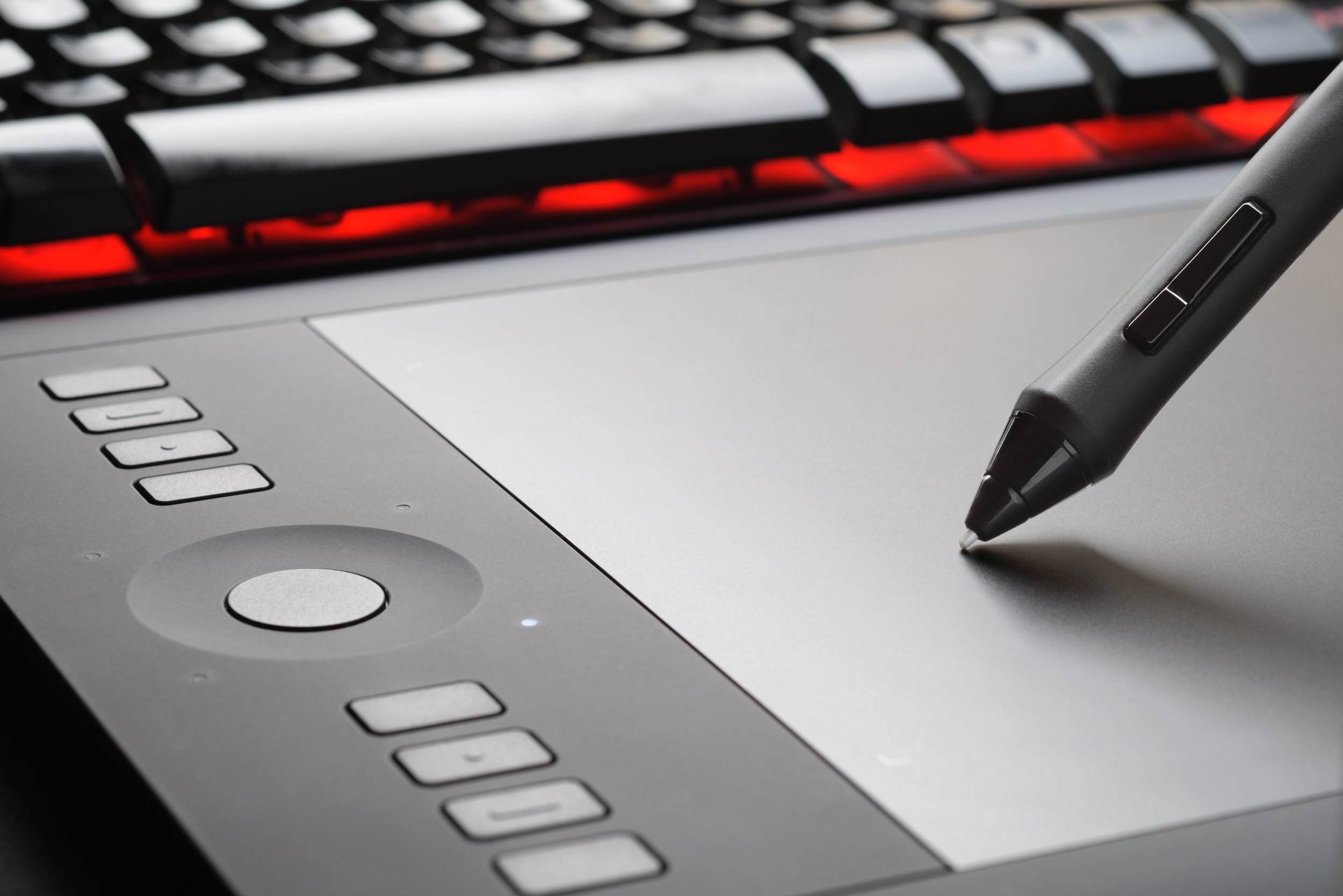 graphic-tablet-with-pen-close-up-photo-2023-11-27-05-07-40-utc.jpg