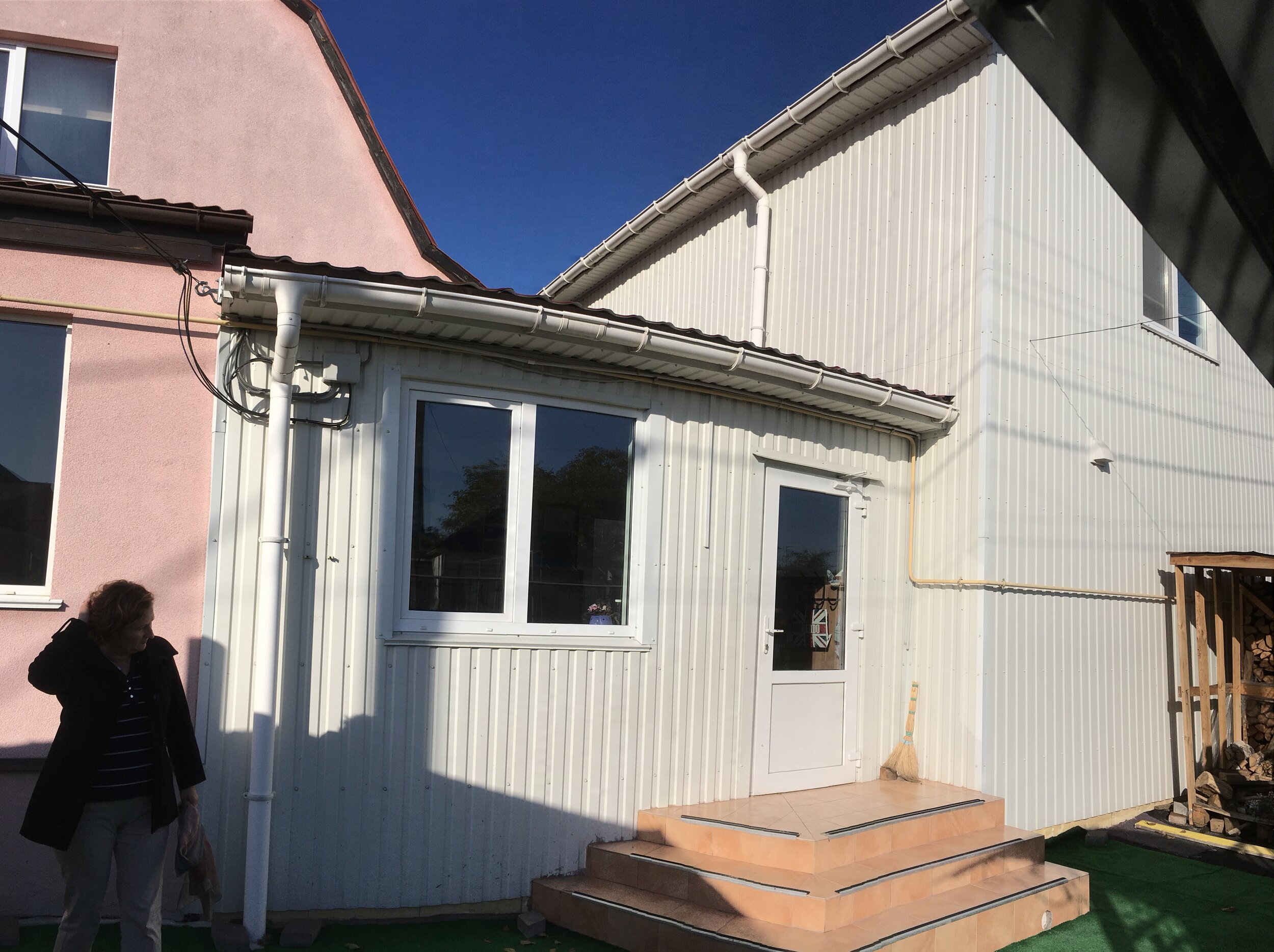  The school was added by the pastor and his volunteers in June 2012, with a connecting foyer to the old village house. 