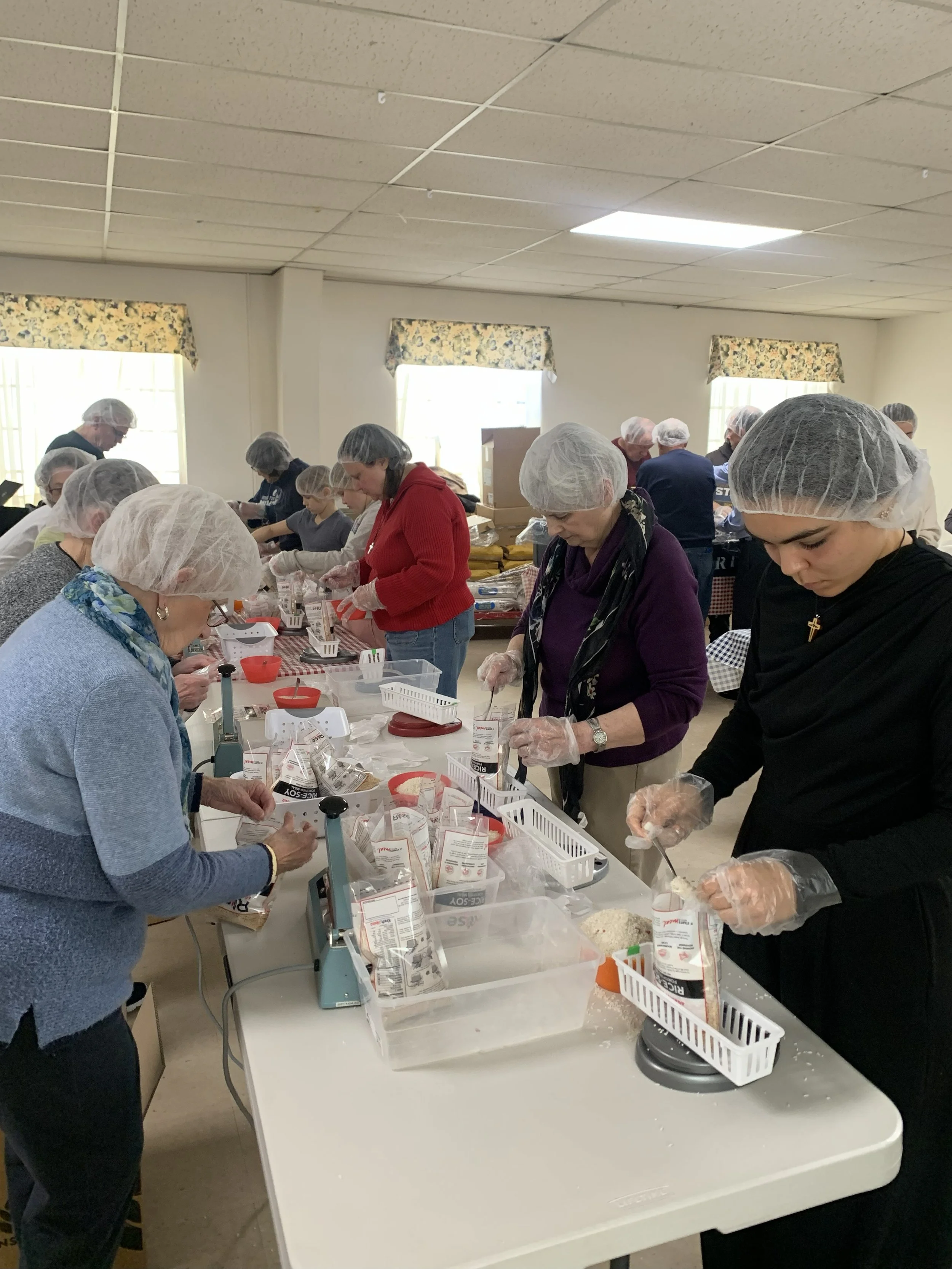 Judy, Cathy, etc.-Rise Against Hunger.jpeg