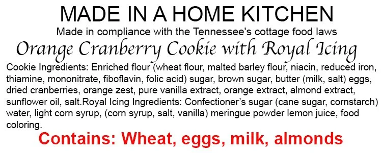 Label for Orange Cranberry Cookie with Royal Icing showing ingredients and allergy information, including wheat, eggs, milk, and almonds.