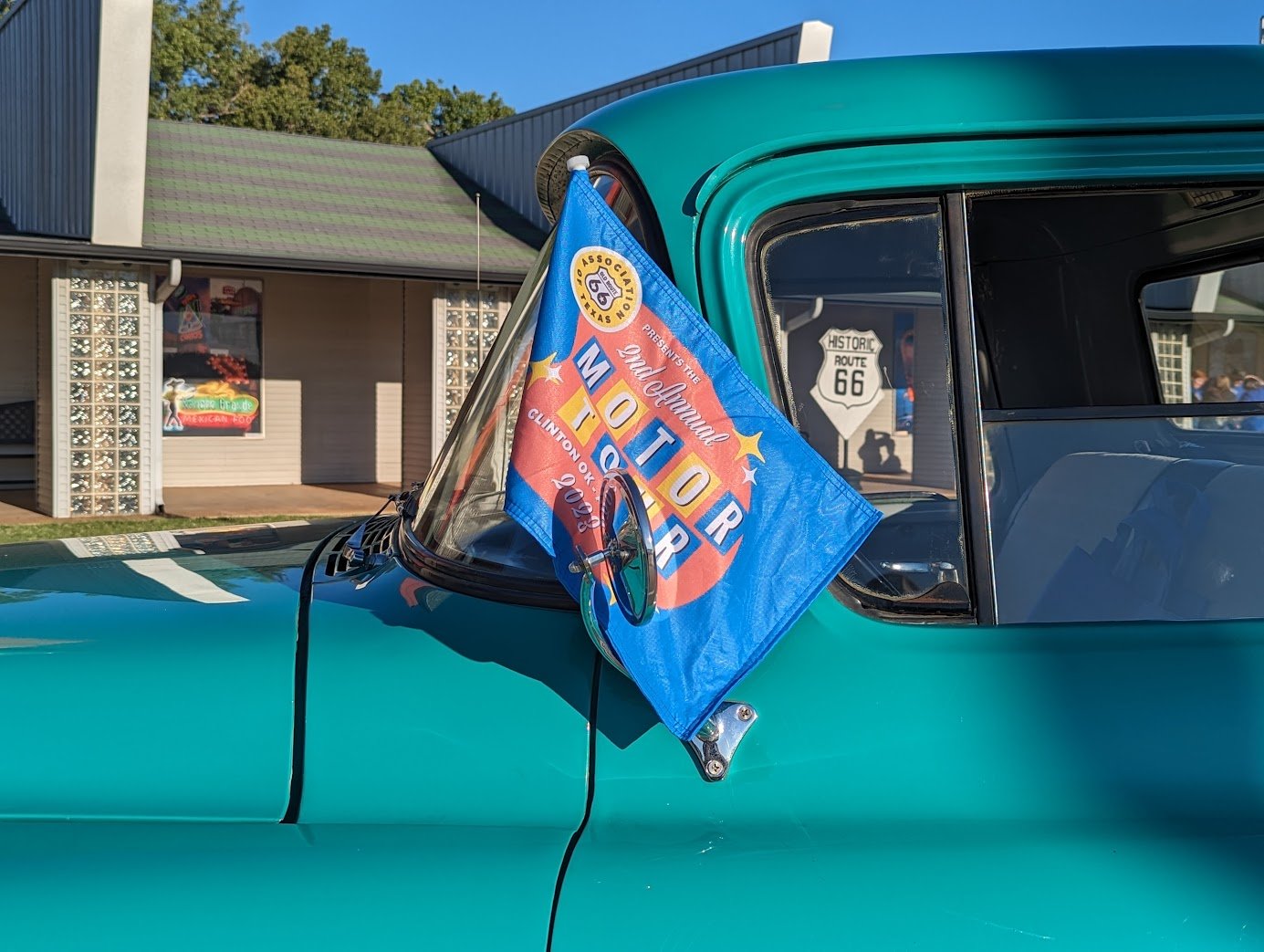  One of the Motor Tour flags on a classic pickup at the Oklahoma Route 66 Museum in Clinton 