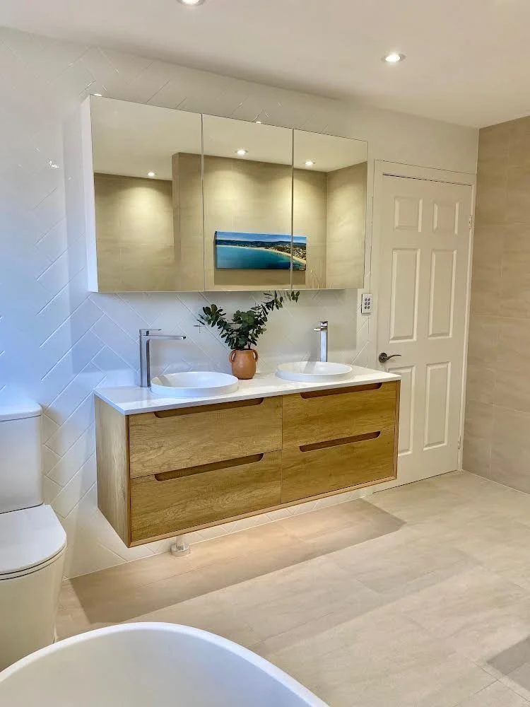 Bathroom renovation with new downlights, LEDs under the sink, extraction fan and temperature control