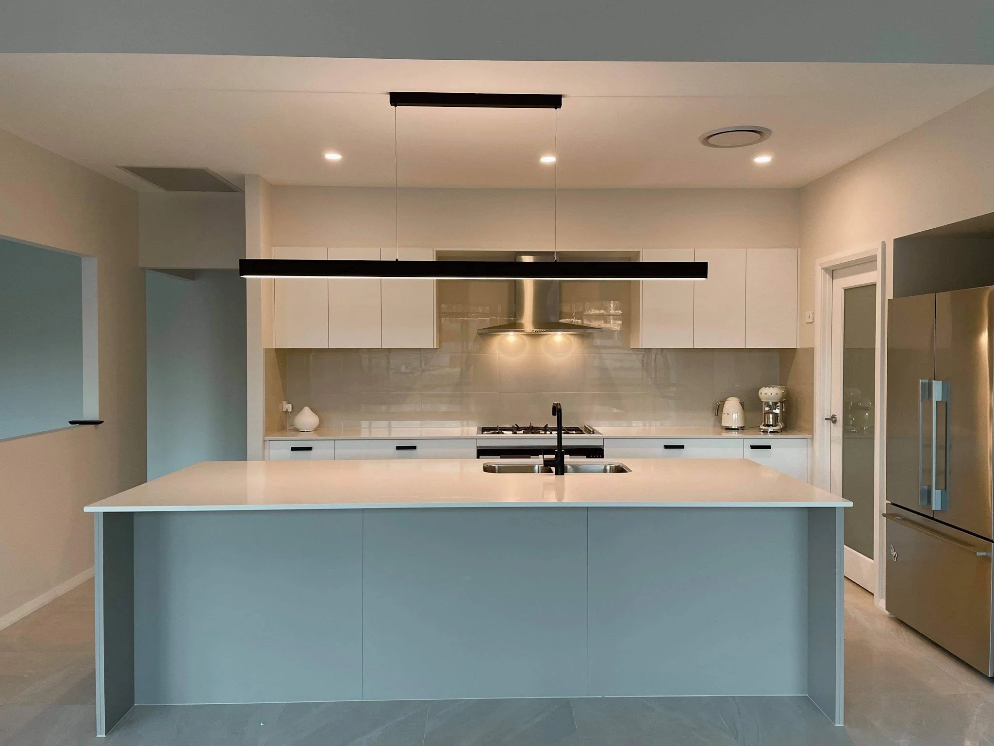 Kitchen renovation with all new lighting and appliances