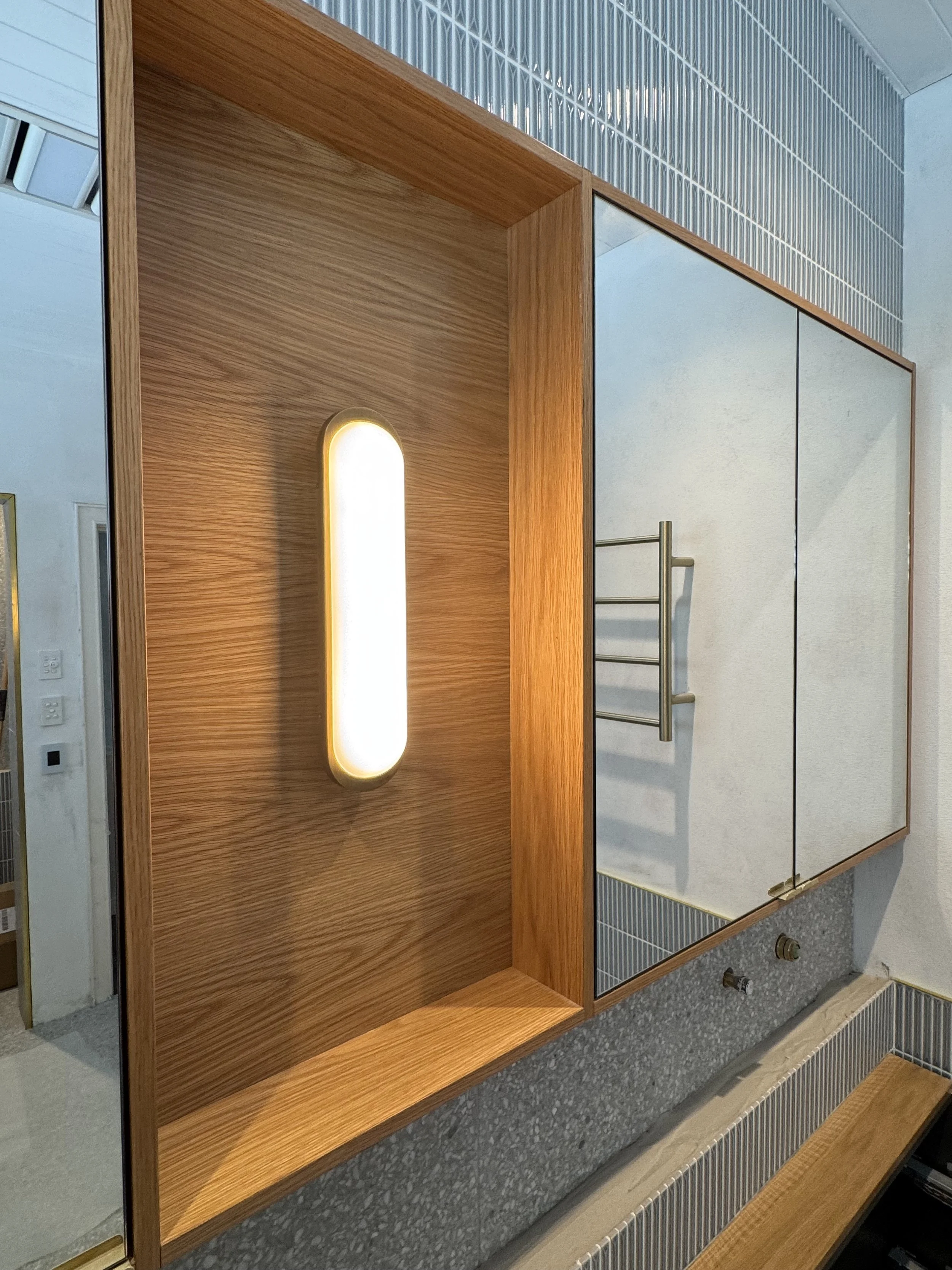 Bathroom renovation with new downlights, beauty lights, extraction fan, heated towel rack and temperature control