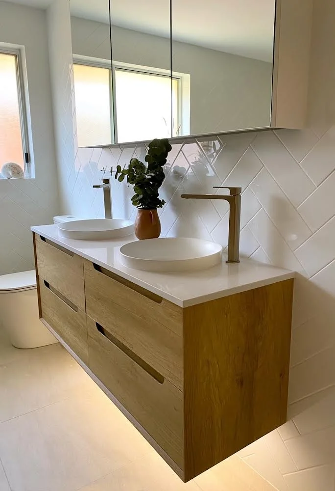 Bathroom renovation with new downlights, LEDs under the sink, extraction fan and temperature control