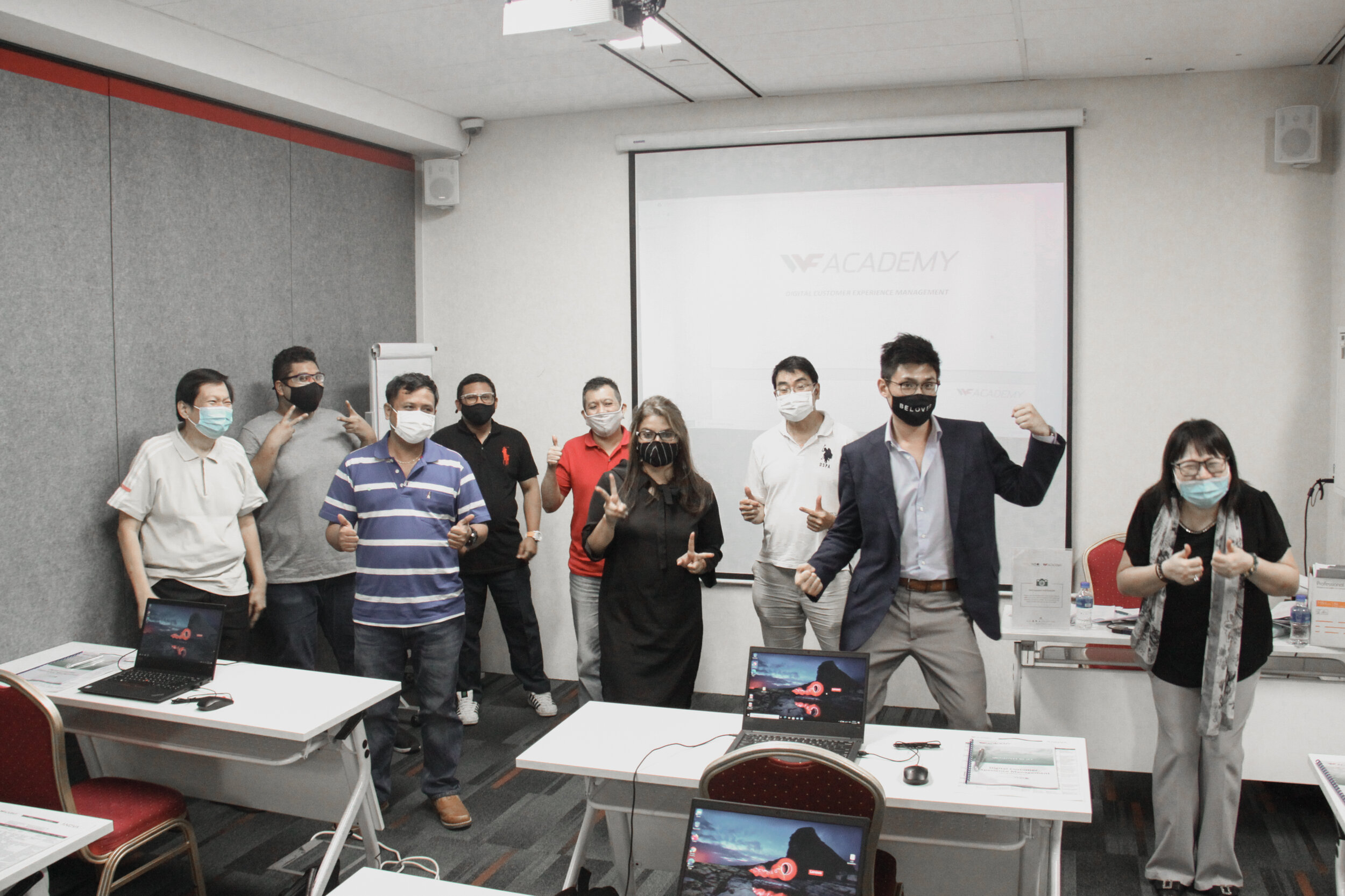 Group photo of trainer Cheak Hong Ian with the first batch of learners from the WSQ Digital Customer Experience Management training course