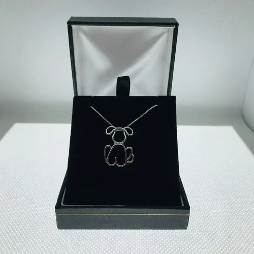 sterling silver hollow sitting dog pendant on sterling silver chain