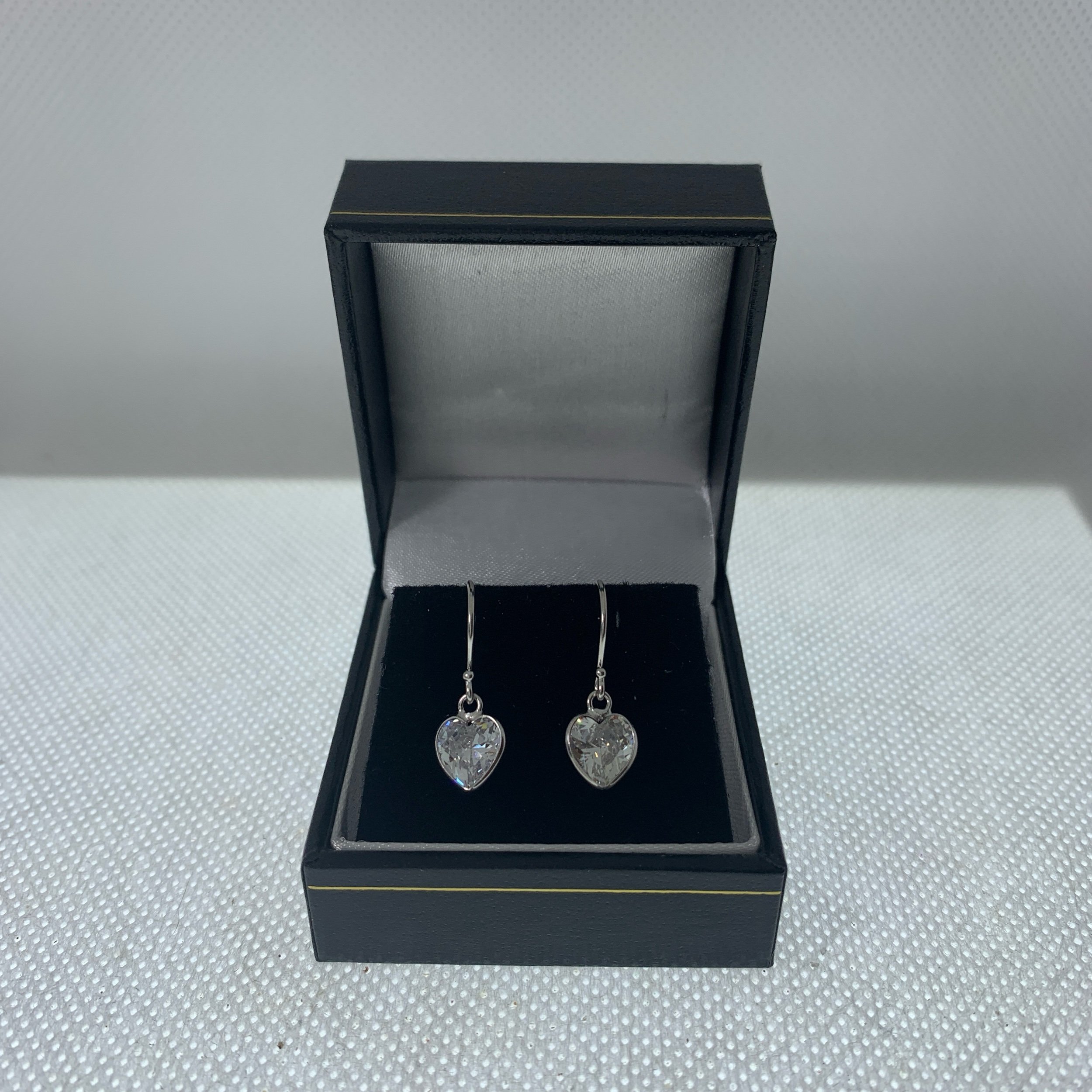 7 mm wide clear cubic zirconia and sterling silver heart drop earrings
