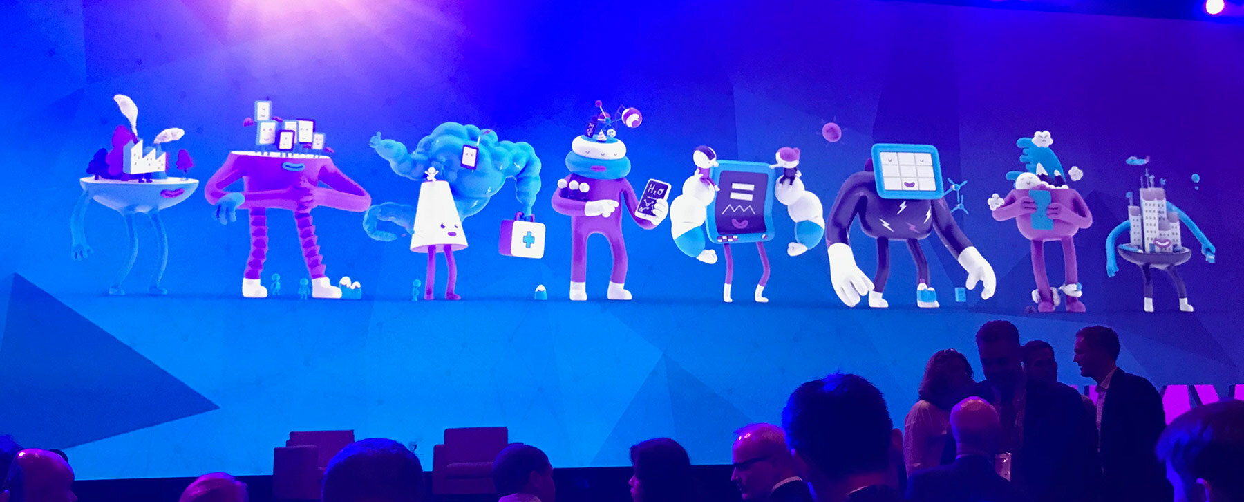 Group line-up of 3D animated SDG characters projected on a massive LED screen at MWC Shanghai. 