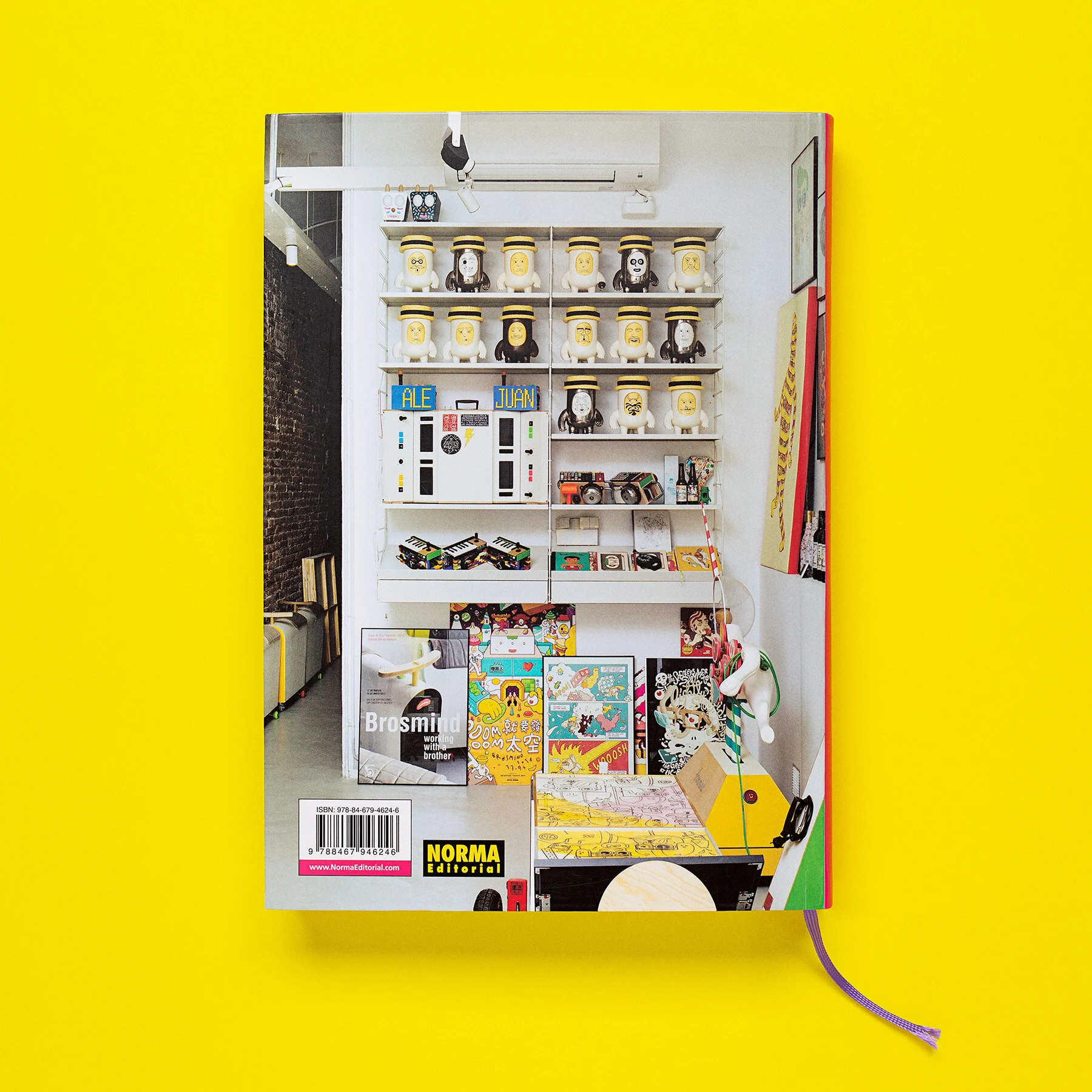 Back cover photo showing the Barcelona studio workspace packed with sculptures and custom art. 