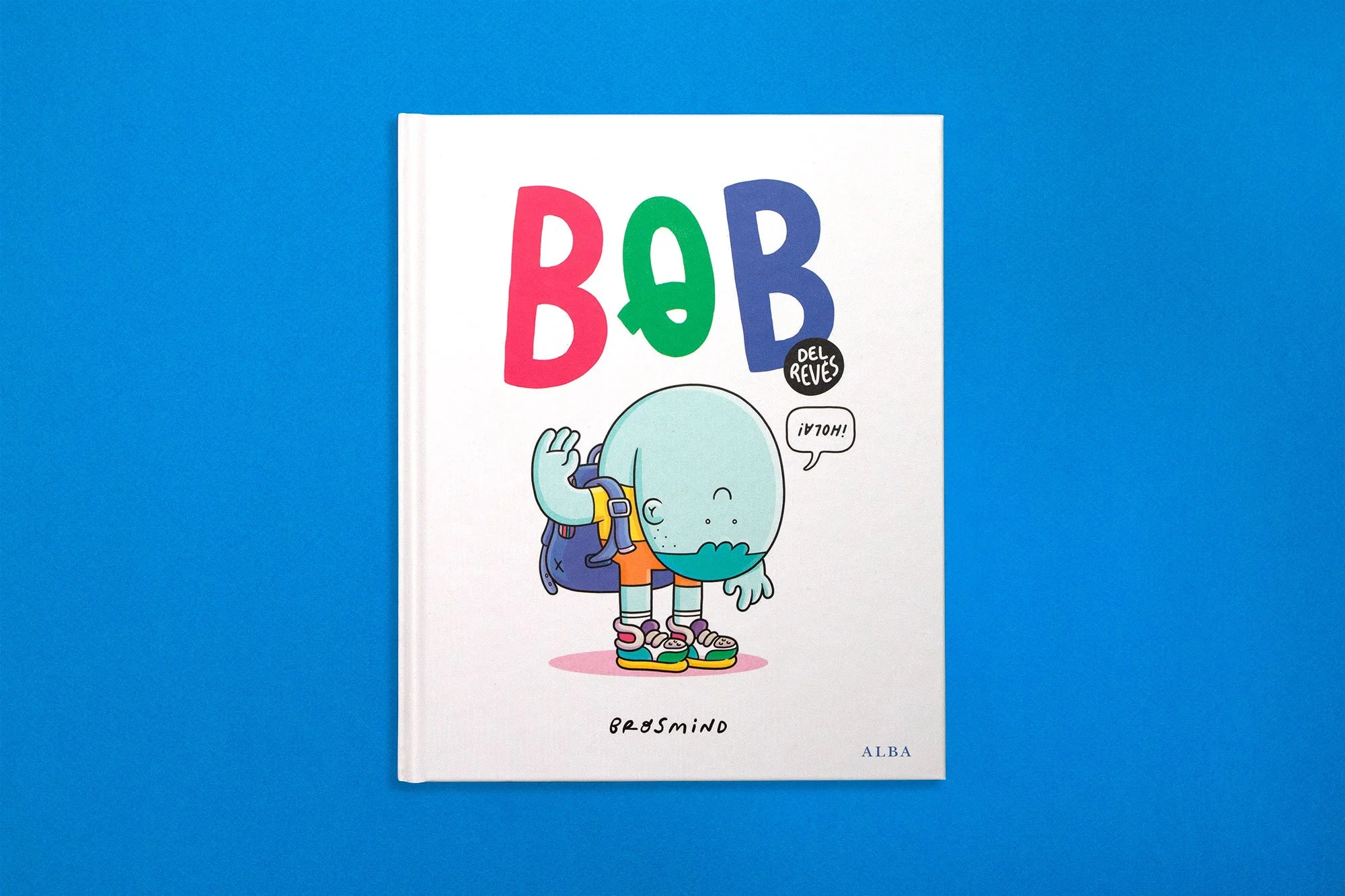 Front cover of the Bob Upside Down children's picture book on a blue background, displaying the upside-down boy character artwork.