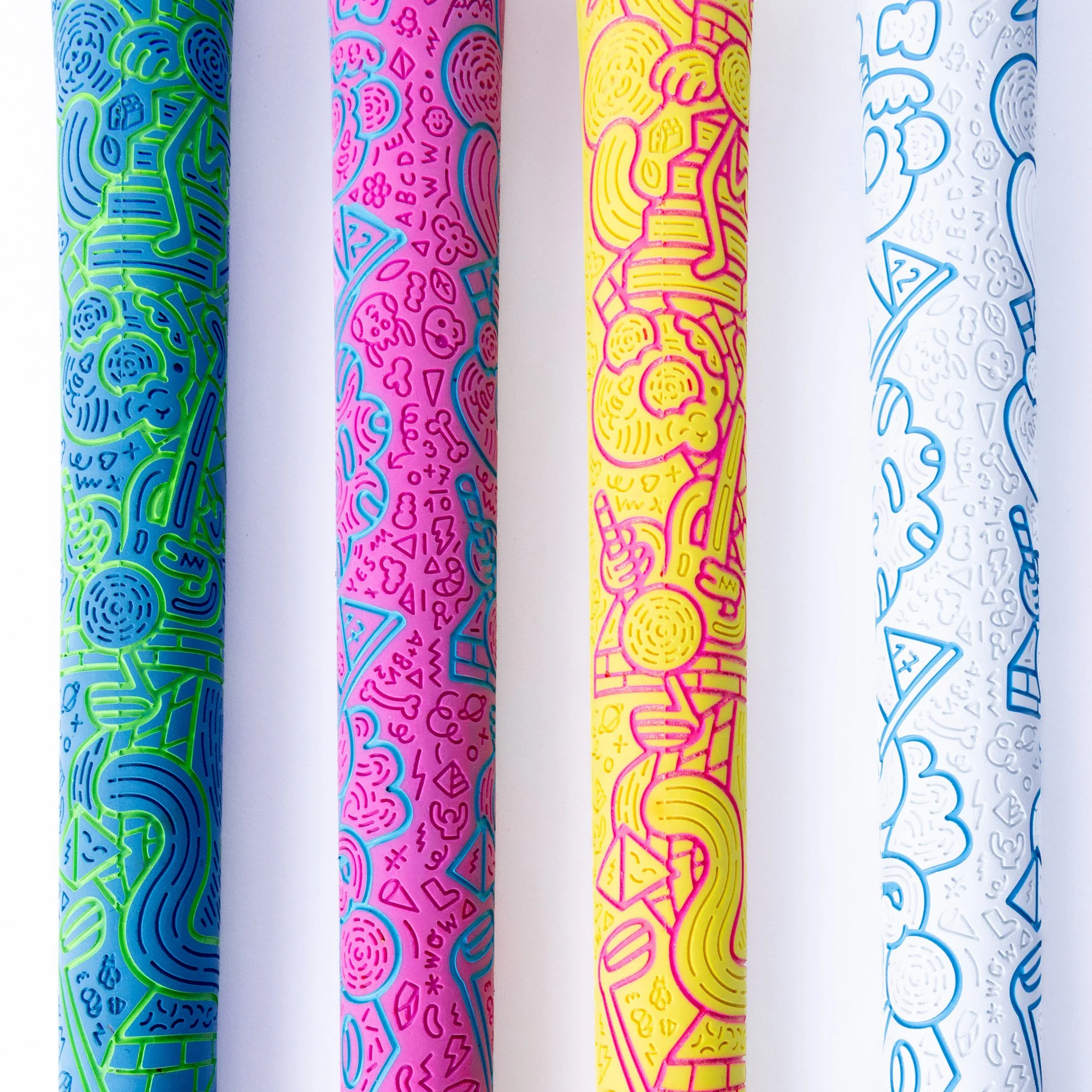 Macro vertical detail showing the carved texture and line art engraving on Brosmind's rubber golf grips for RIPIT Grips.