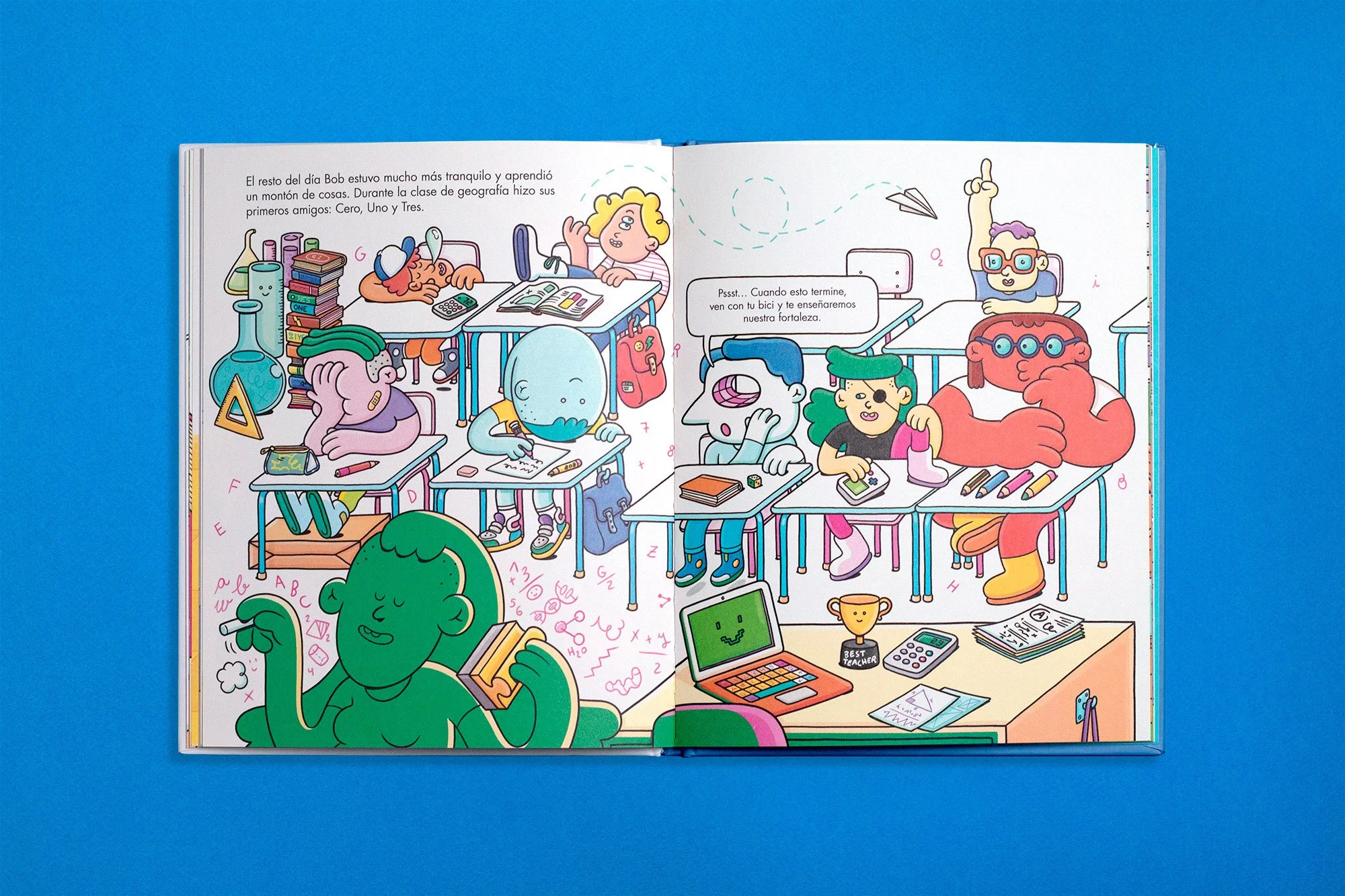 Top-down photo of an open illustrated kids' book double-page spread depicting the main character interacting with unique classmates.