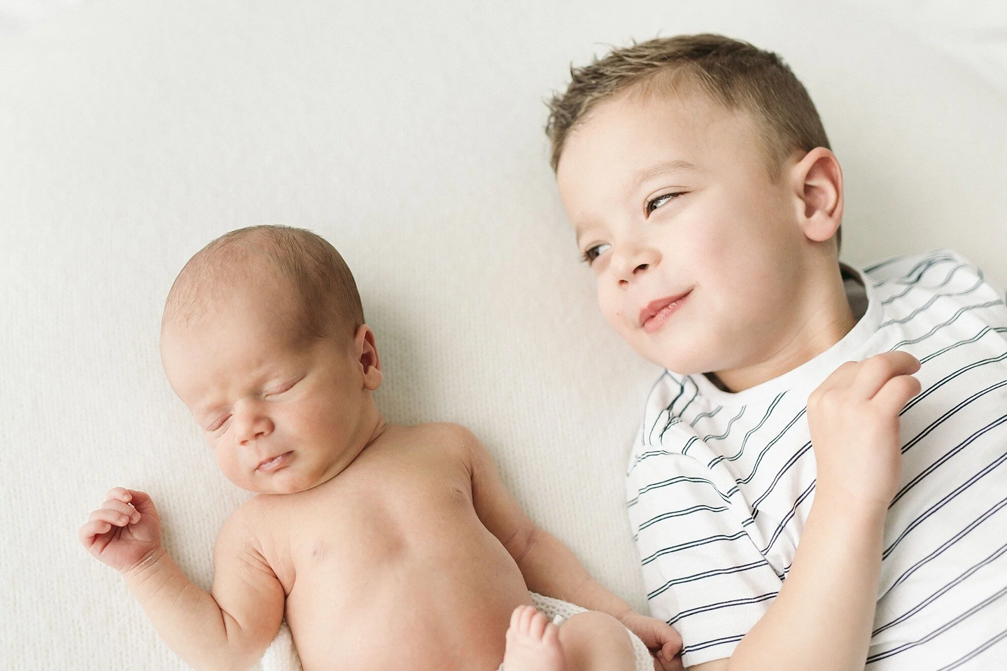   Rachael: I love how Eli is looking like the proud and protective big brother that he has become!  