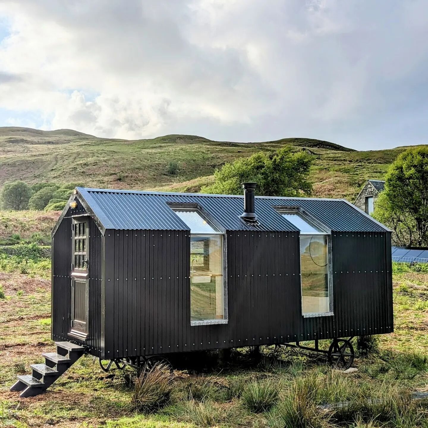 Our lovely all black Bothy really is Oliver's huts unique build. The Bothy offers a cosy space that works for a variety of uses and a place to reflect and take in  beautiful framed views.
The Bothy can go off-grid and make use of solar power or conne