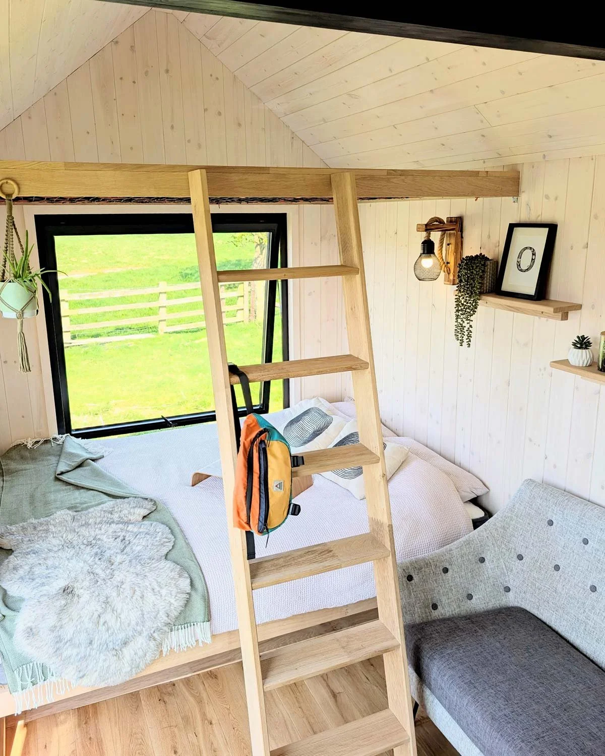 Olivers-Huts-go-cabin-interior-wood-ladder2.jpg