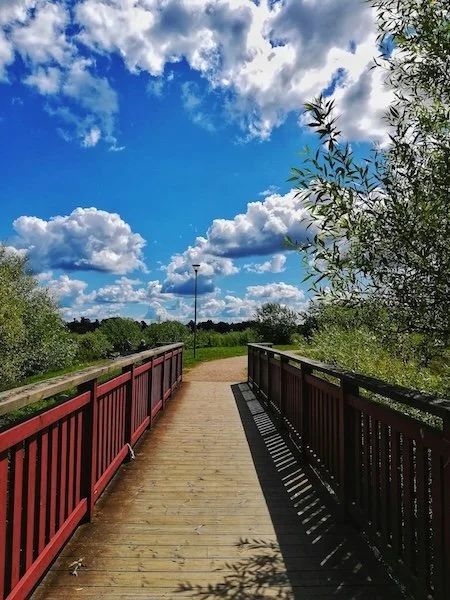 Bridge leading to blue skies