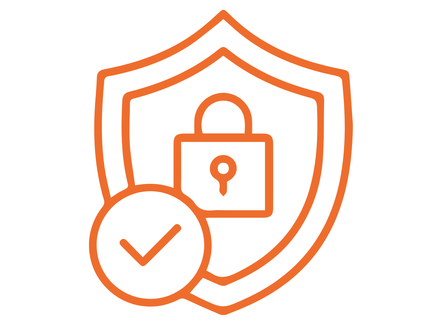 Person working on multiple computer screens in a dimly lit room.