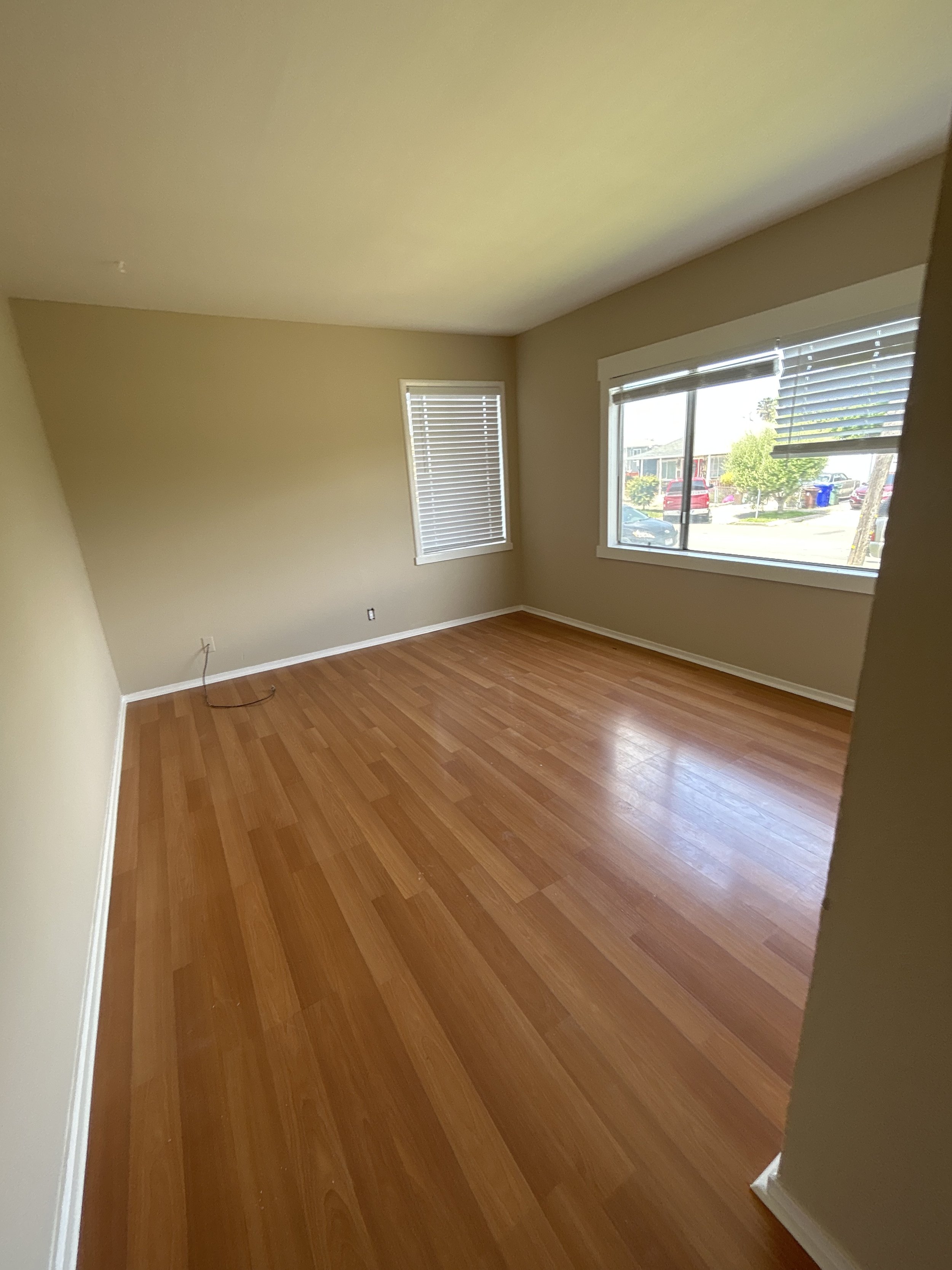 Empty Bedroom with big picture window. getting ready to stage it with Style it Staging.