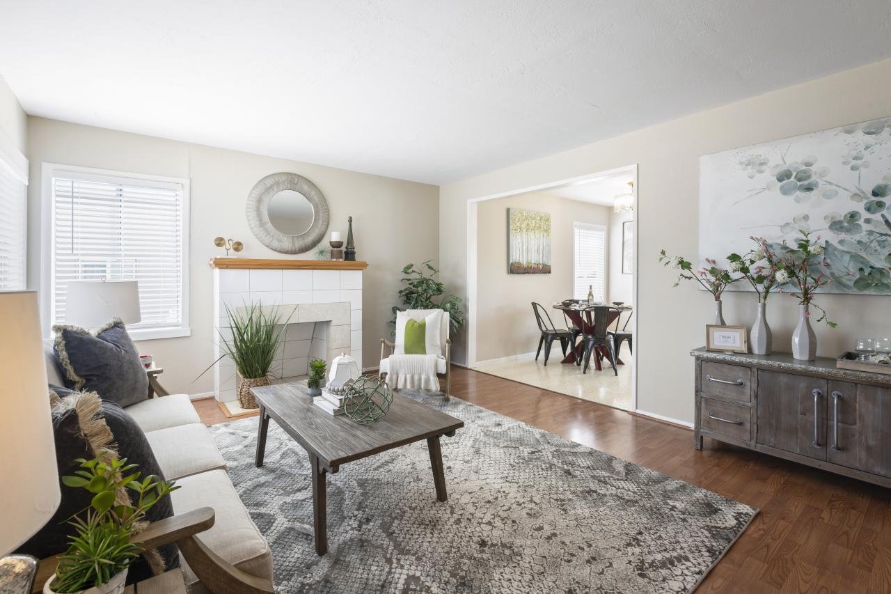Staged to sell living room with fireplace. Style it Staging interior design and staging