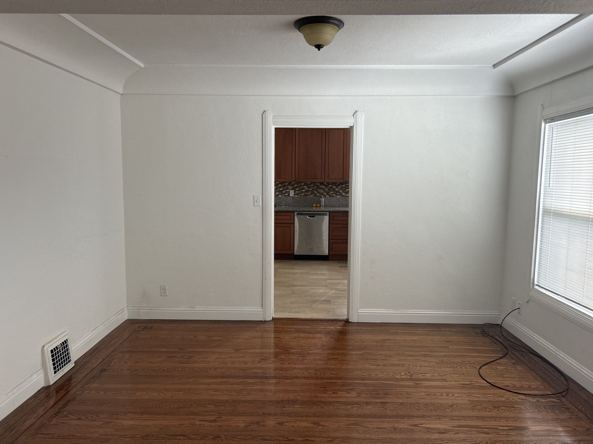 Empty dining room ready to be staged to go on to market, real estate sale.