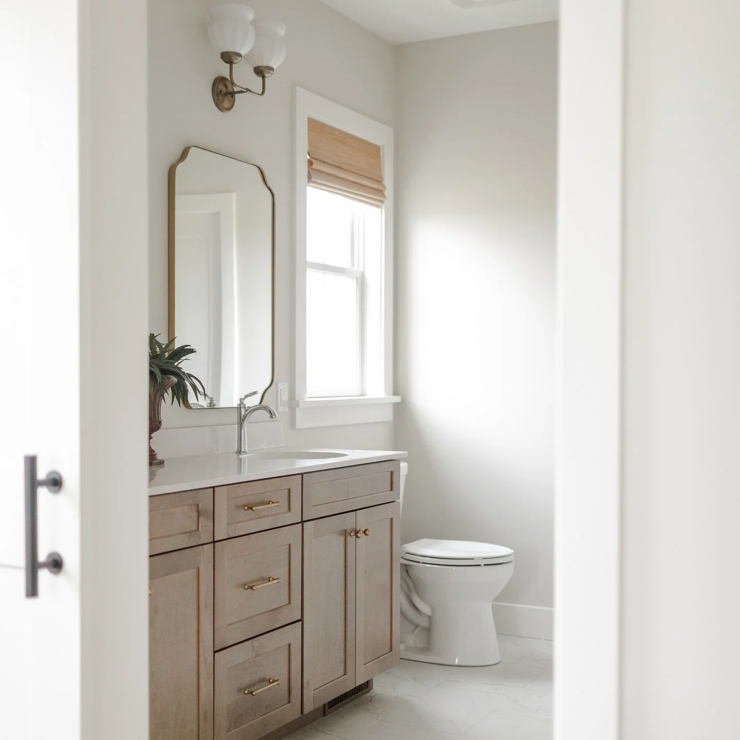 Soft light, warm wood, and just the right amount of contrast 🤍

The Bomber Road primary bathroom proves that quiet design can still make a statement&mdash;clean lines, timeless finishes, and details that feel calm but intentional. A space that feels