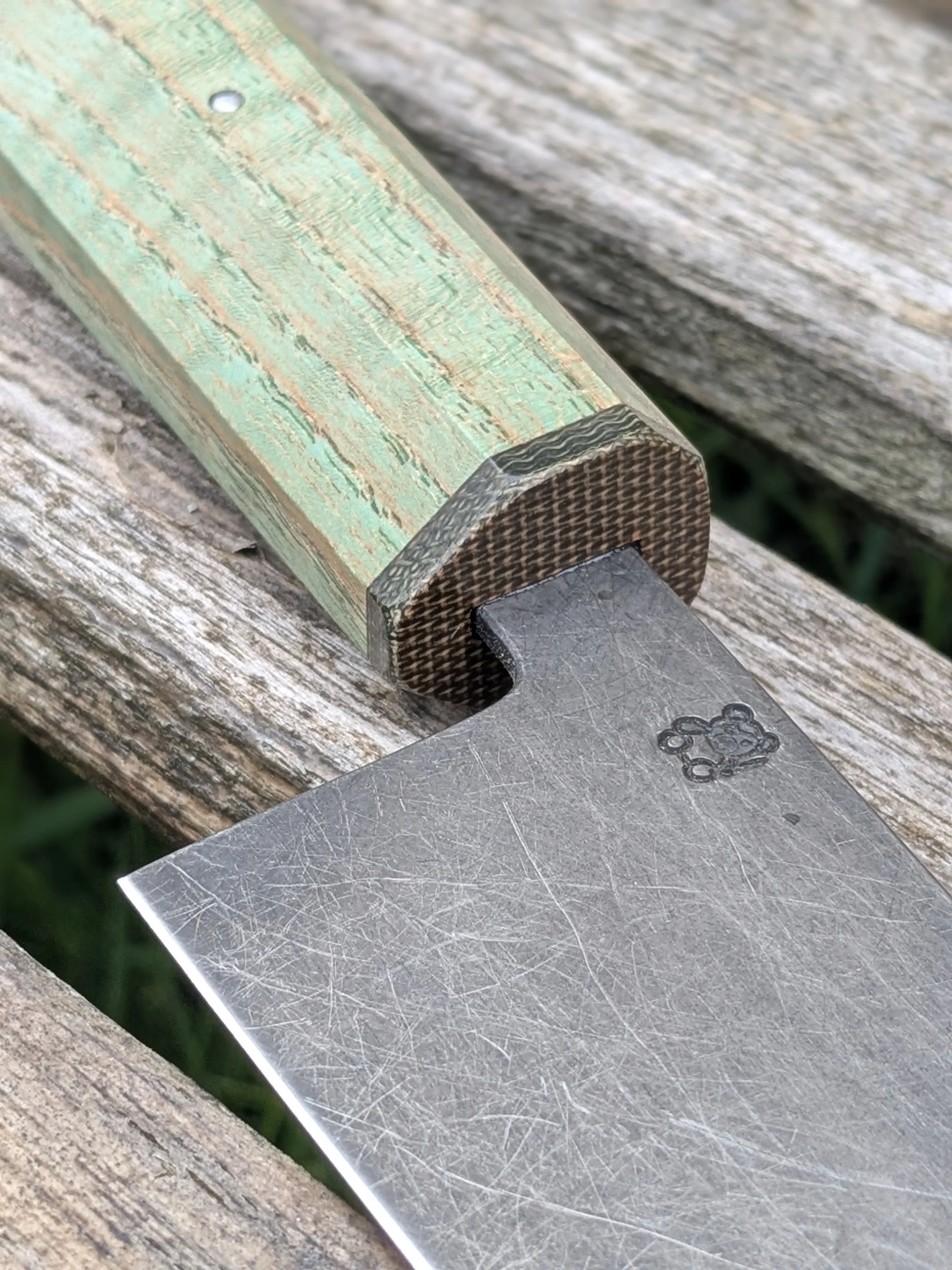 Green canvas micarta ferrule and recessed aluminium pin detail on handmade Gyuto by Teddy's Knives Godalming Surrey