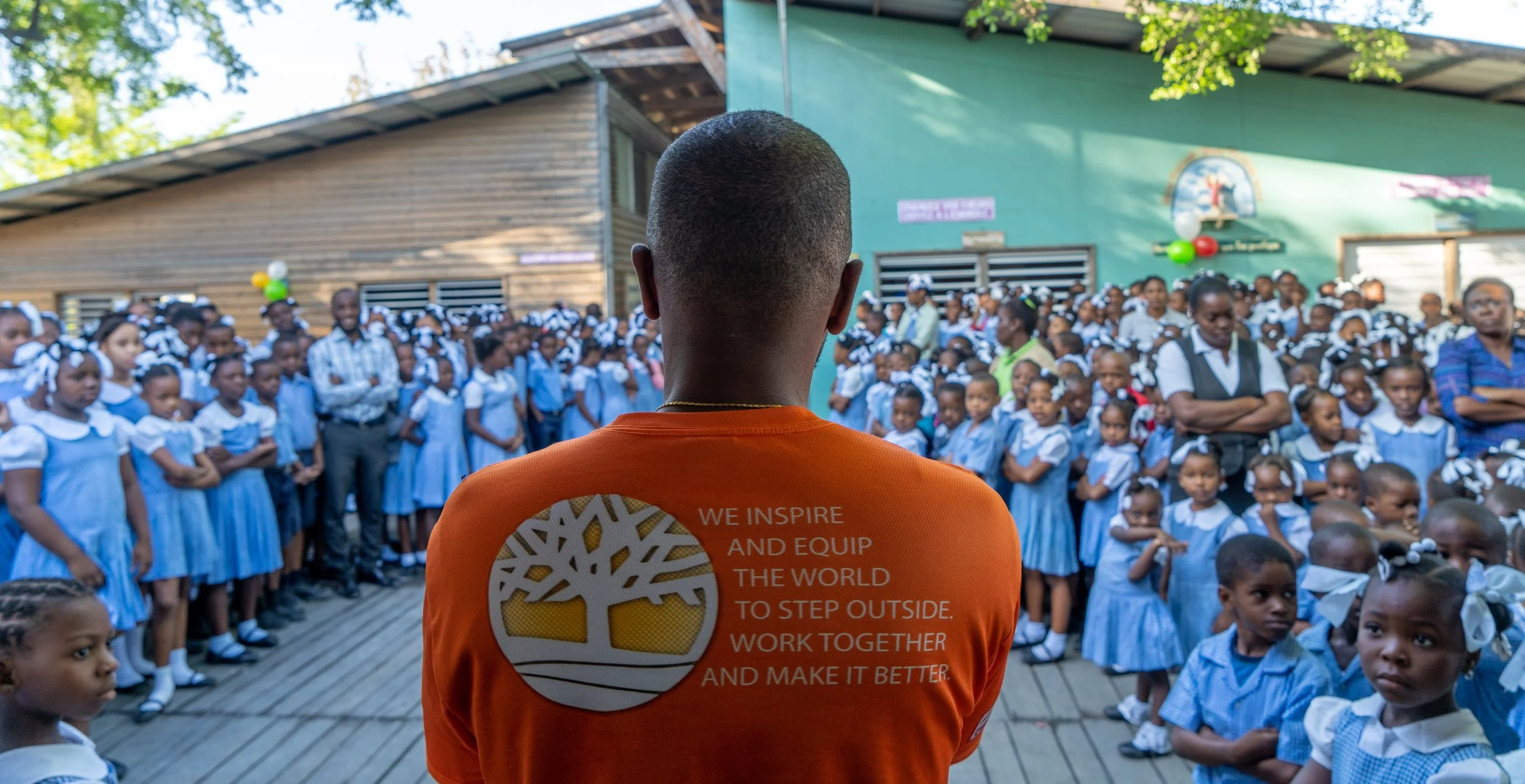 Thony Loui with kids in Jean Paul 2 school in Haiti..jpeg