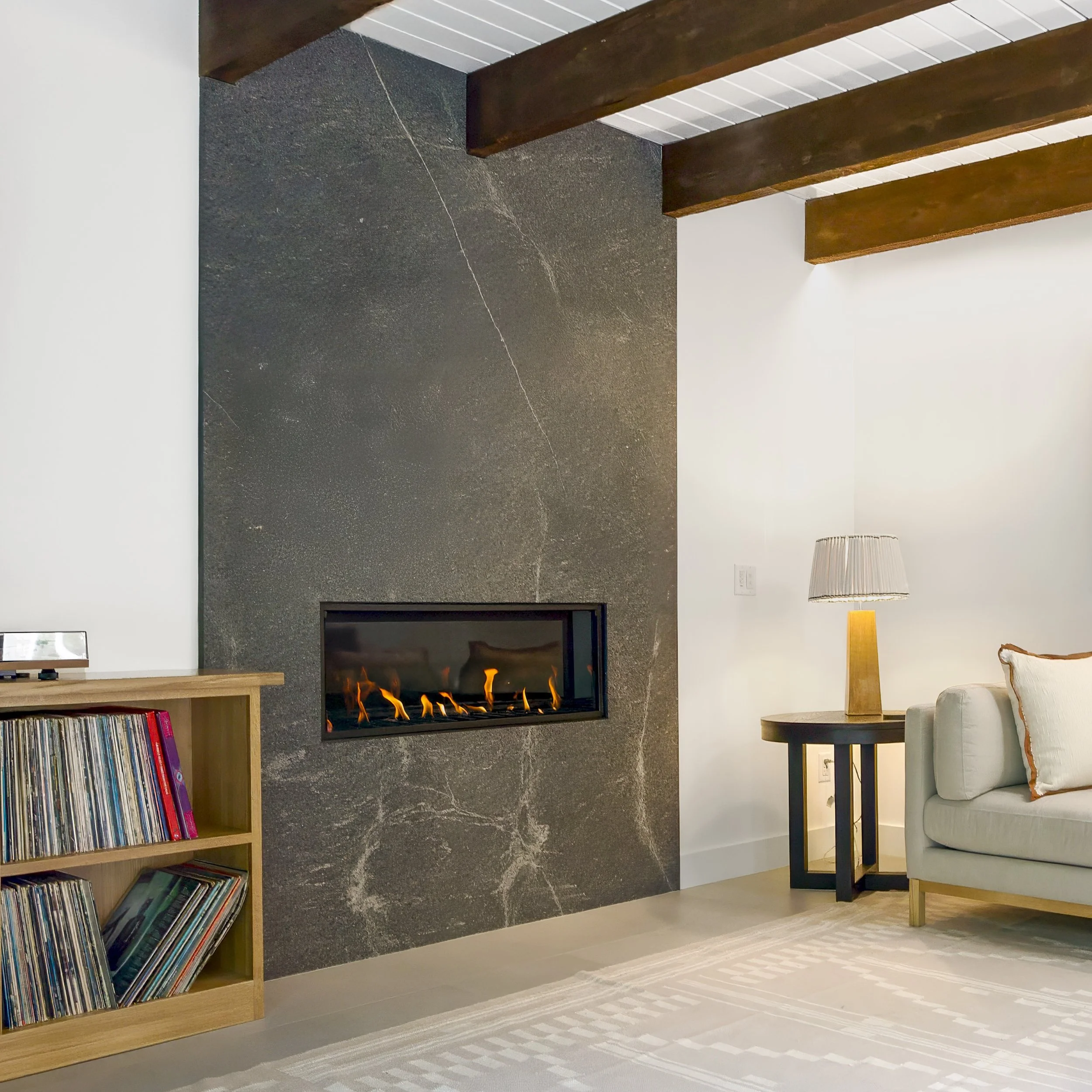 Custom-designed fireplace and vinyl record storage